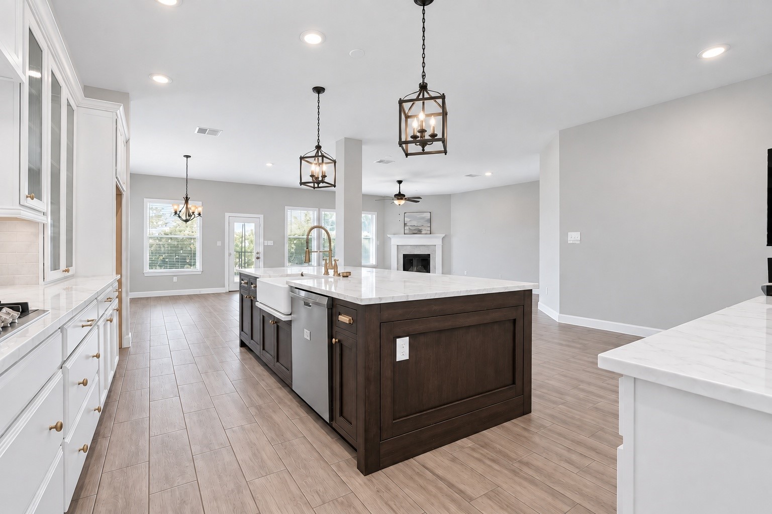 Open-concept kitchen flows seamlessly into the dining area and spacious living room.