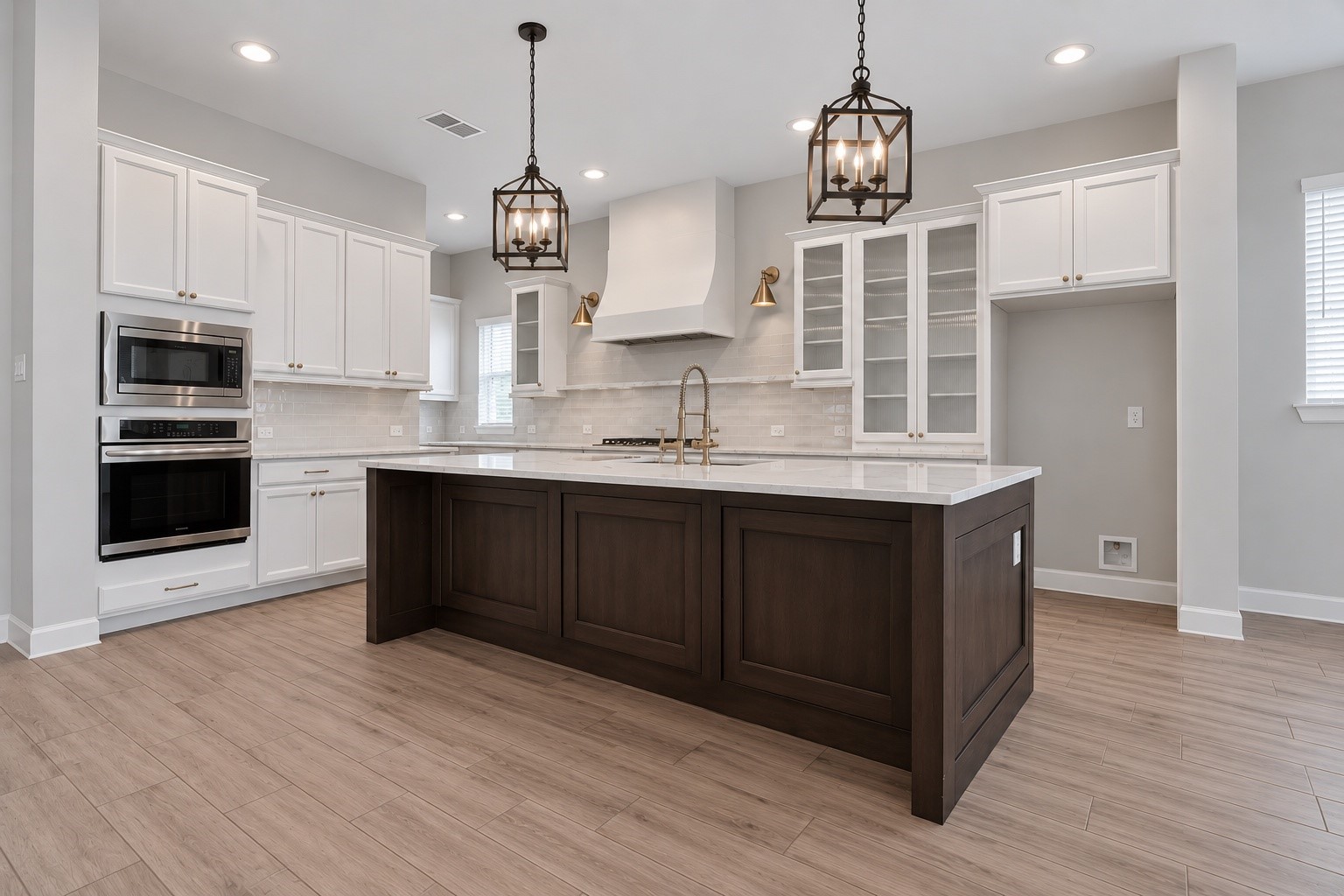 Open-concept kitchen flows seamlessly into the dining area and spacious living room.