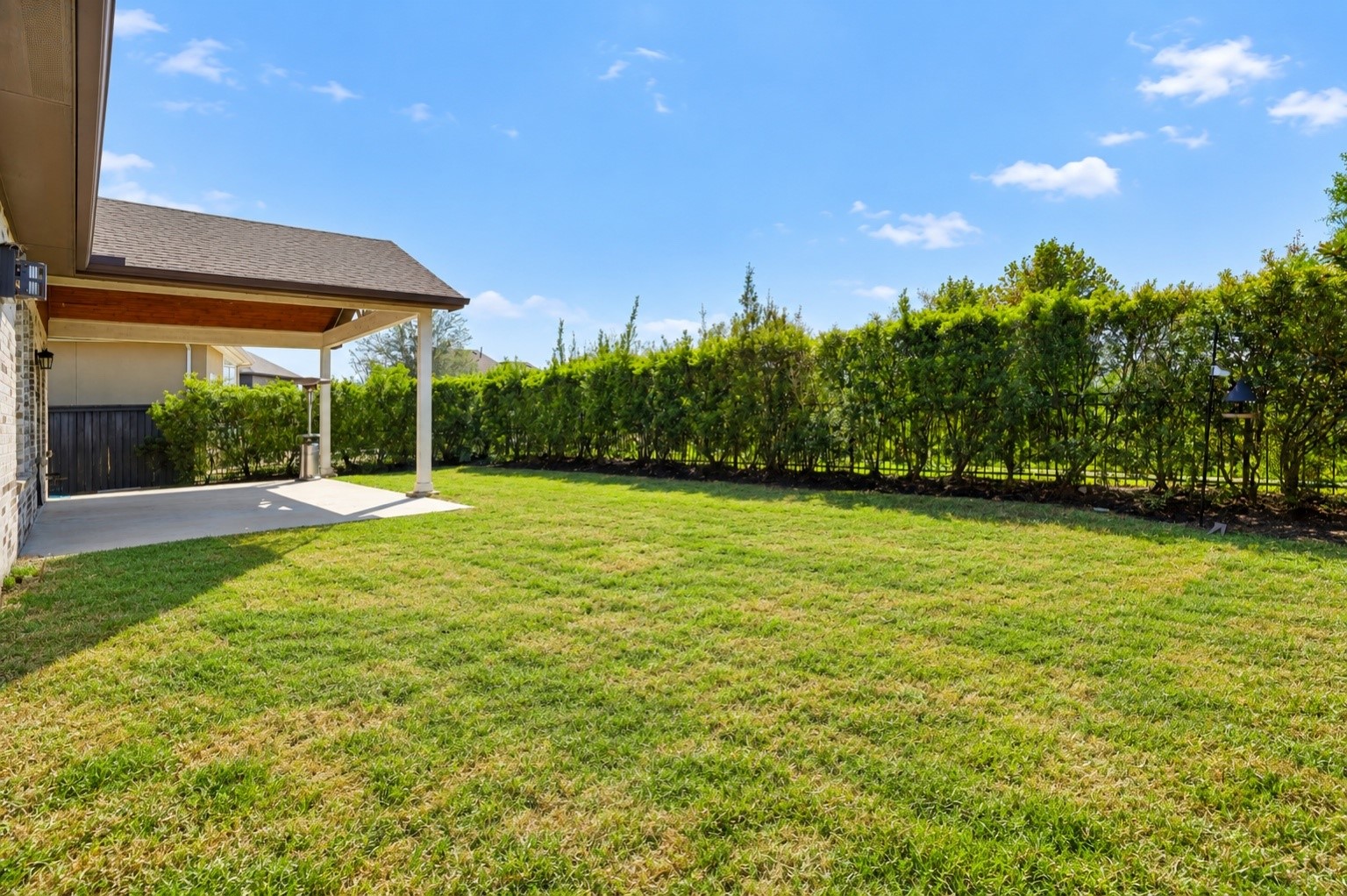 Spacious backyard and no back neighbors for added privacy.