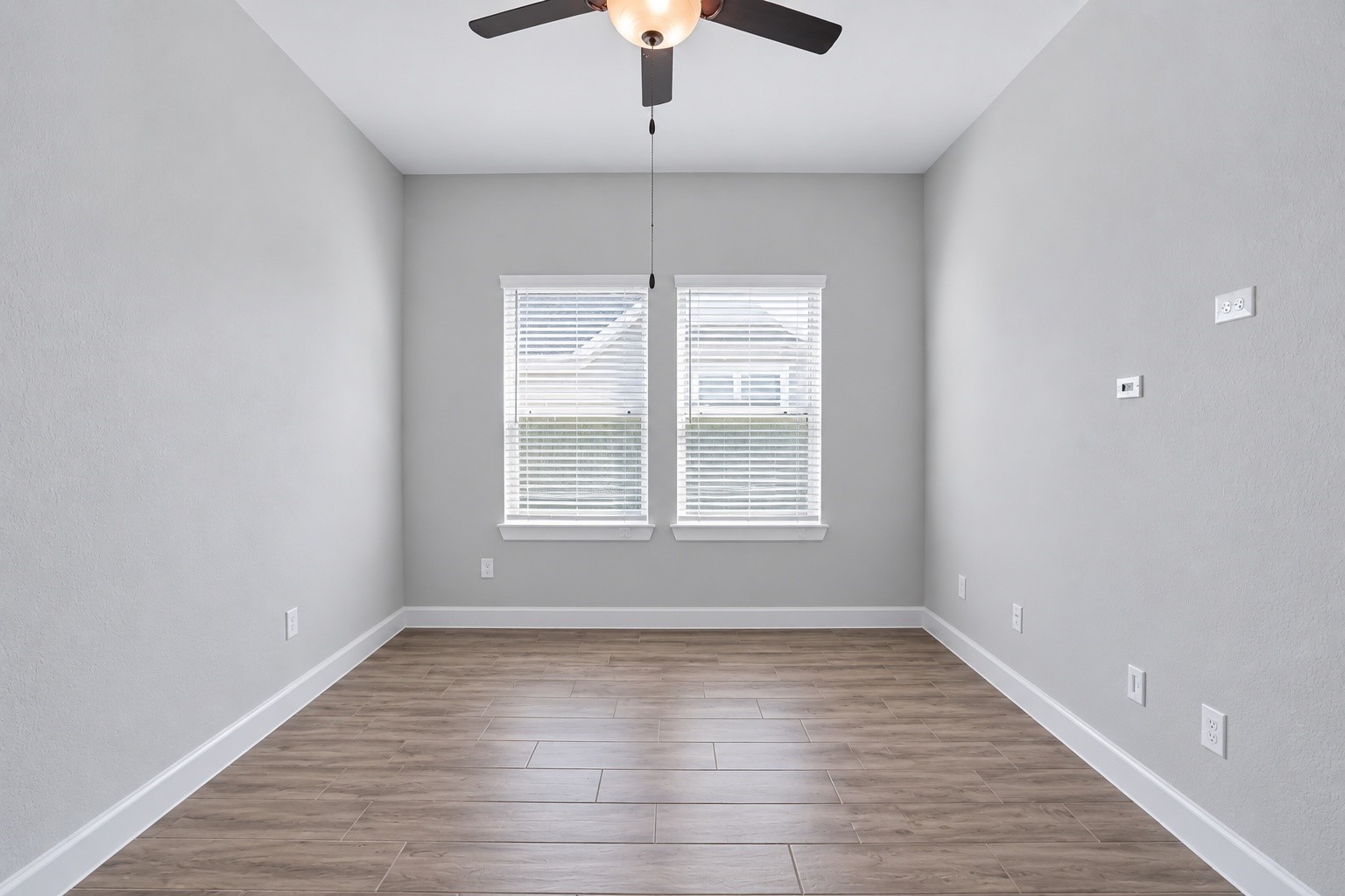 Private home office with French doors, perfect for work or study.