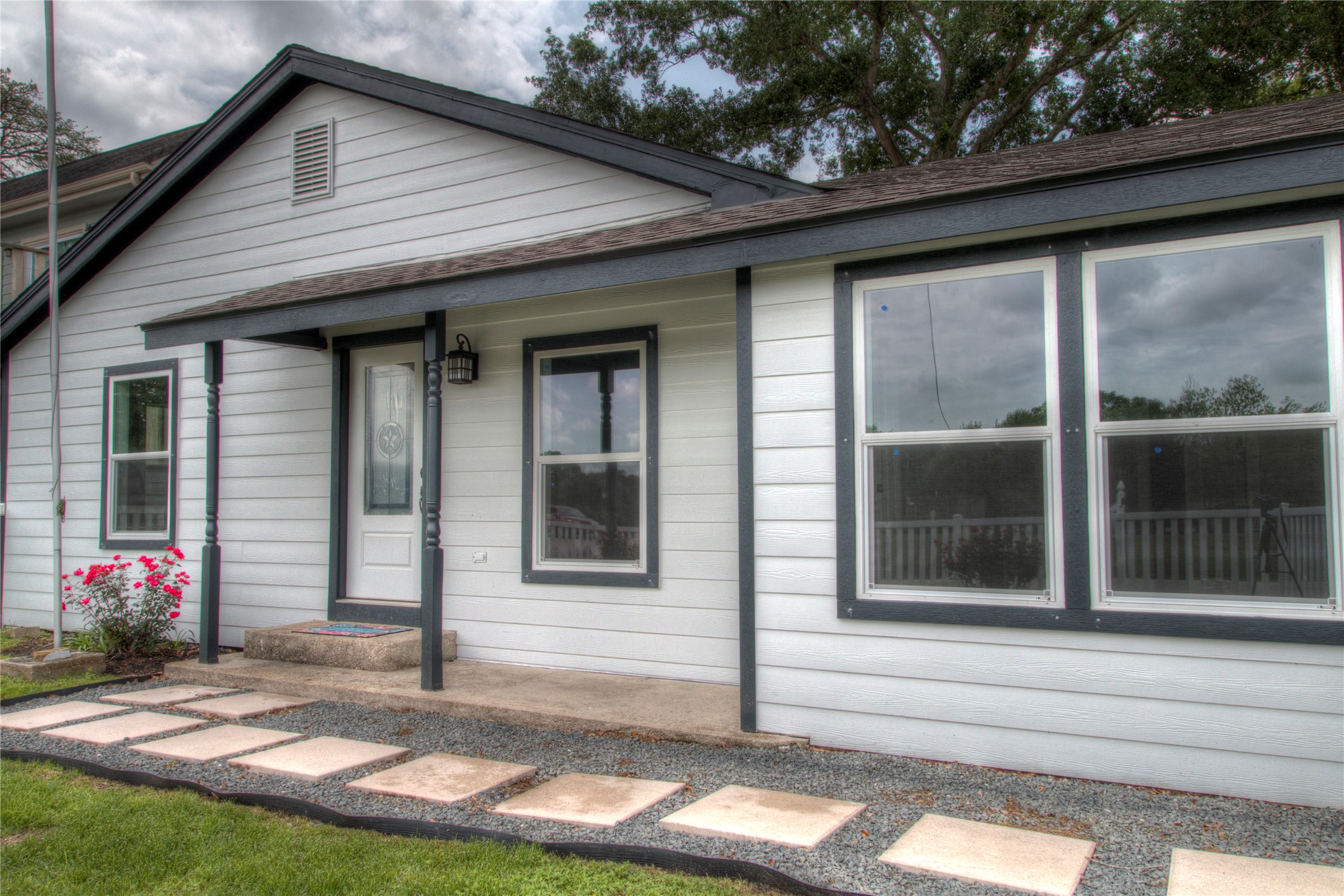 Charming one-story home with a stylish renovation and classic white picket fence, offering a perfect blend of modern comfort and timeless appeal. Charming one-story home with a stylish renovation and classic white picket fence, offering a perfect blend of modern comfort and timeless appeal.