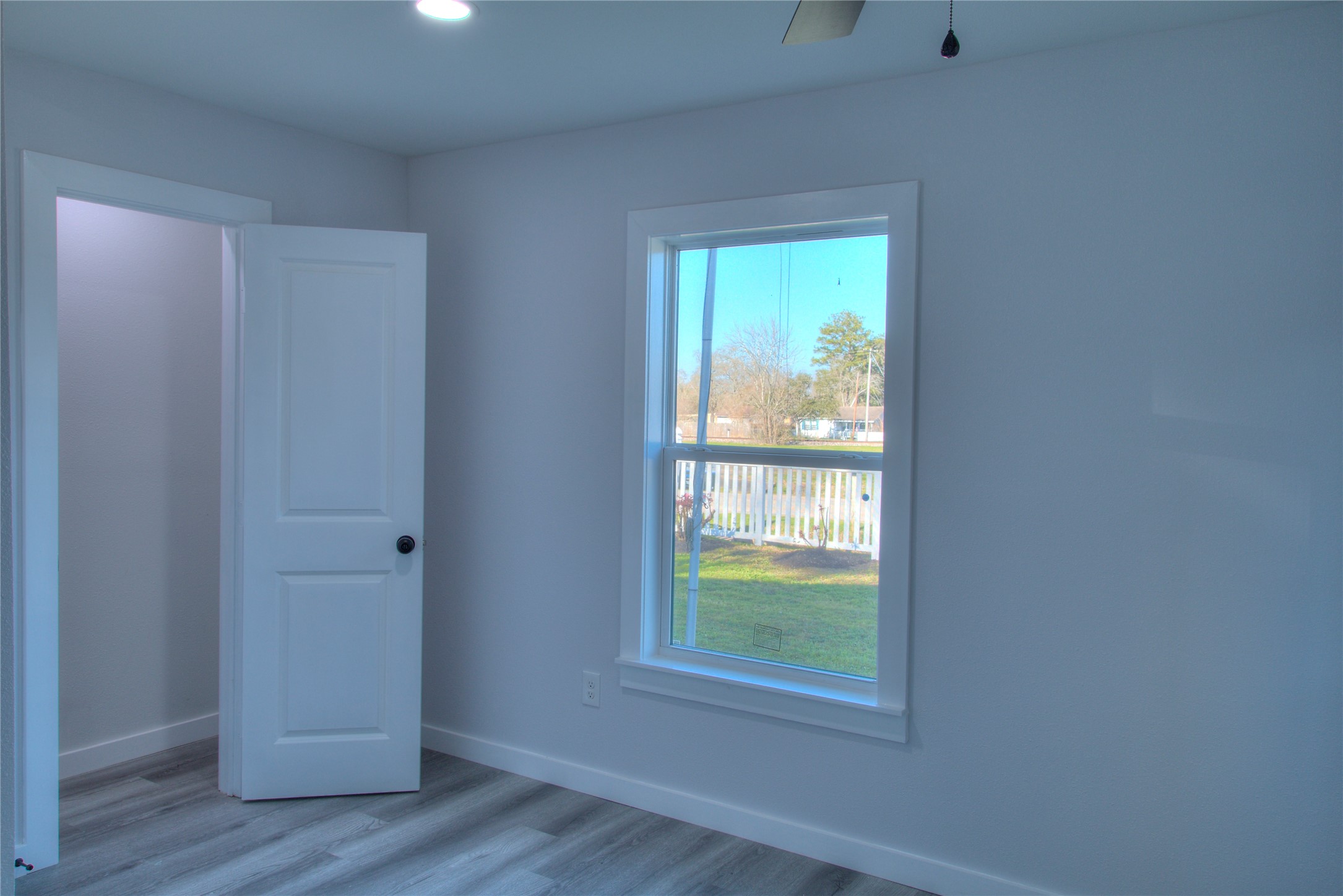 Spacious secondary bedroom featuring a convenient walk-in closet.