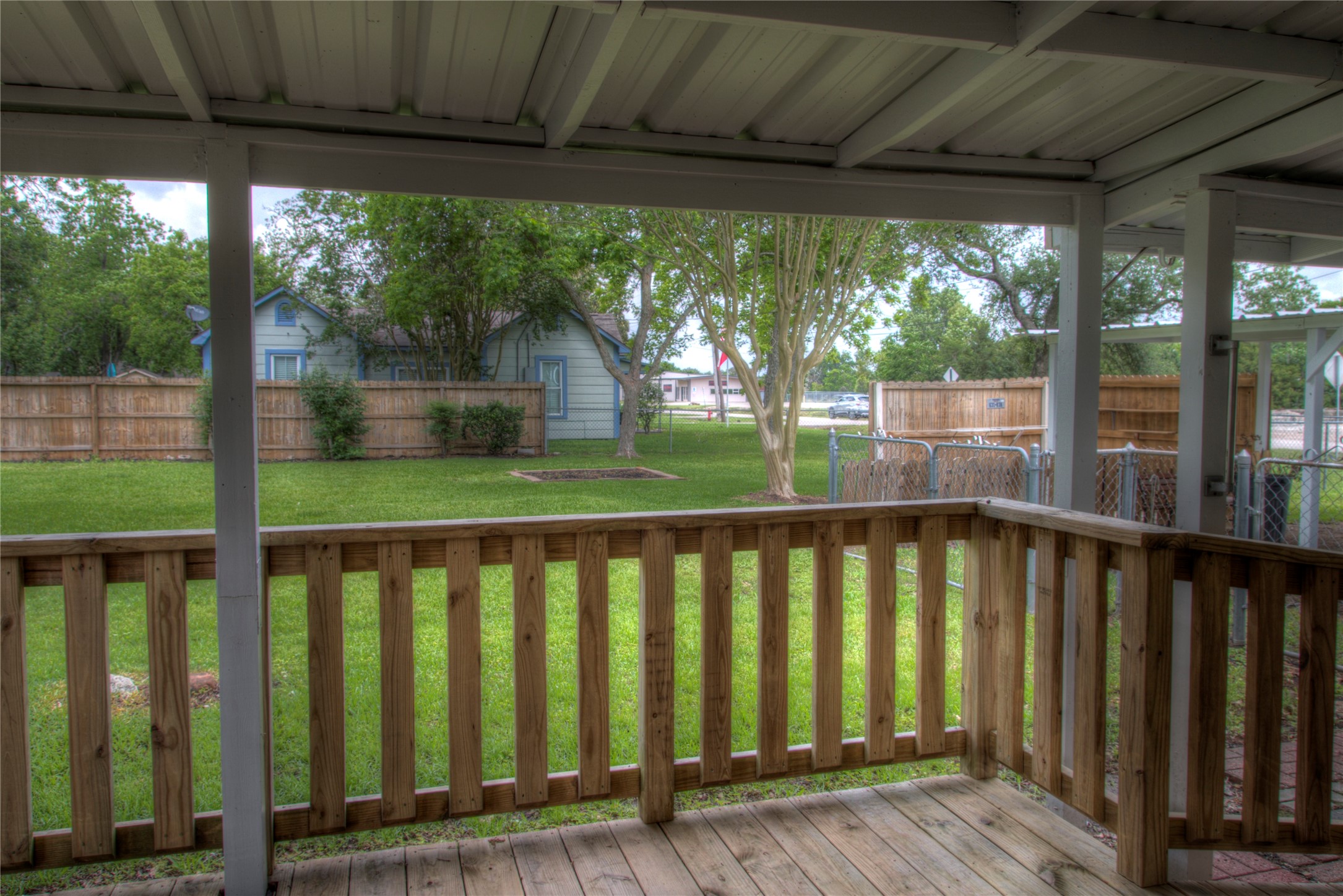 View from Wood Deck Patio to large backyard