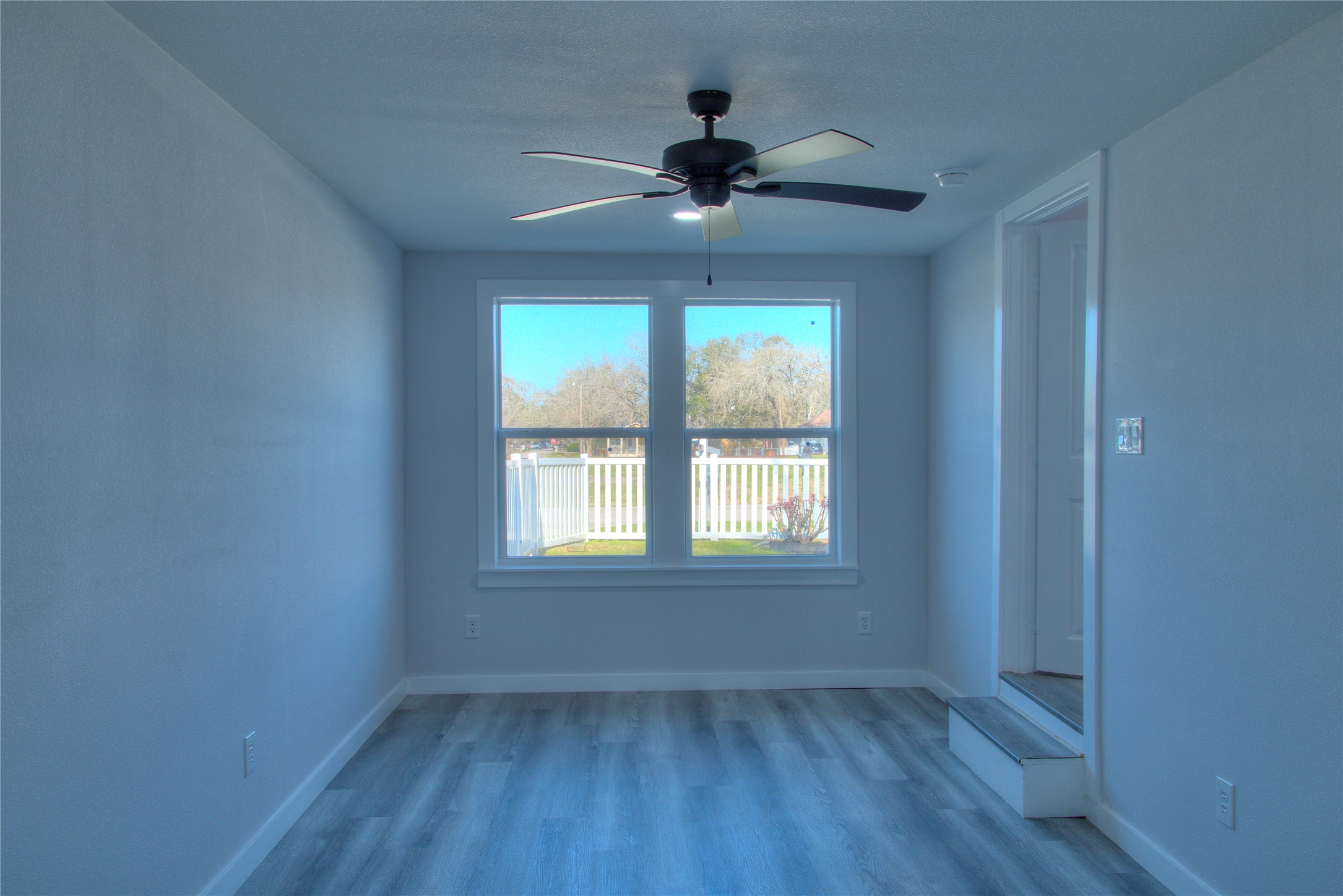Spacious secondary bedroom featuring a convenient walk-in closet.