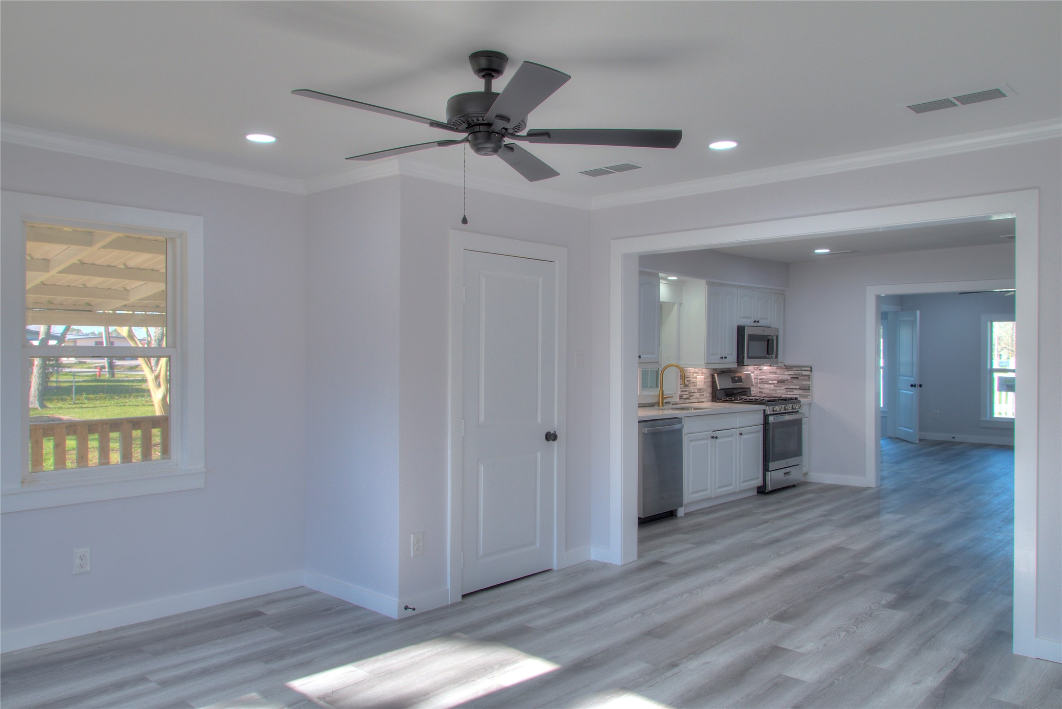 A seamless flow from the dining room to the kitchen, featuring a convenient walk-in pantry. A seamless flow from the dining room to the kitchen, featuring a convenient walk-in pantry.