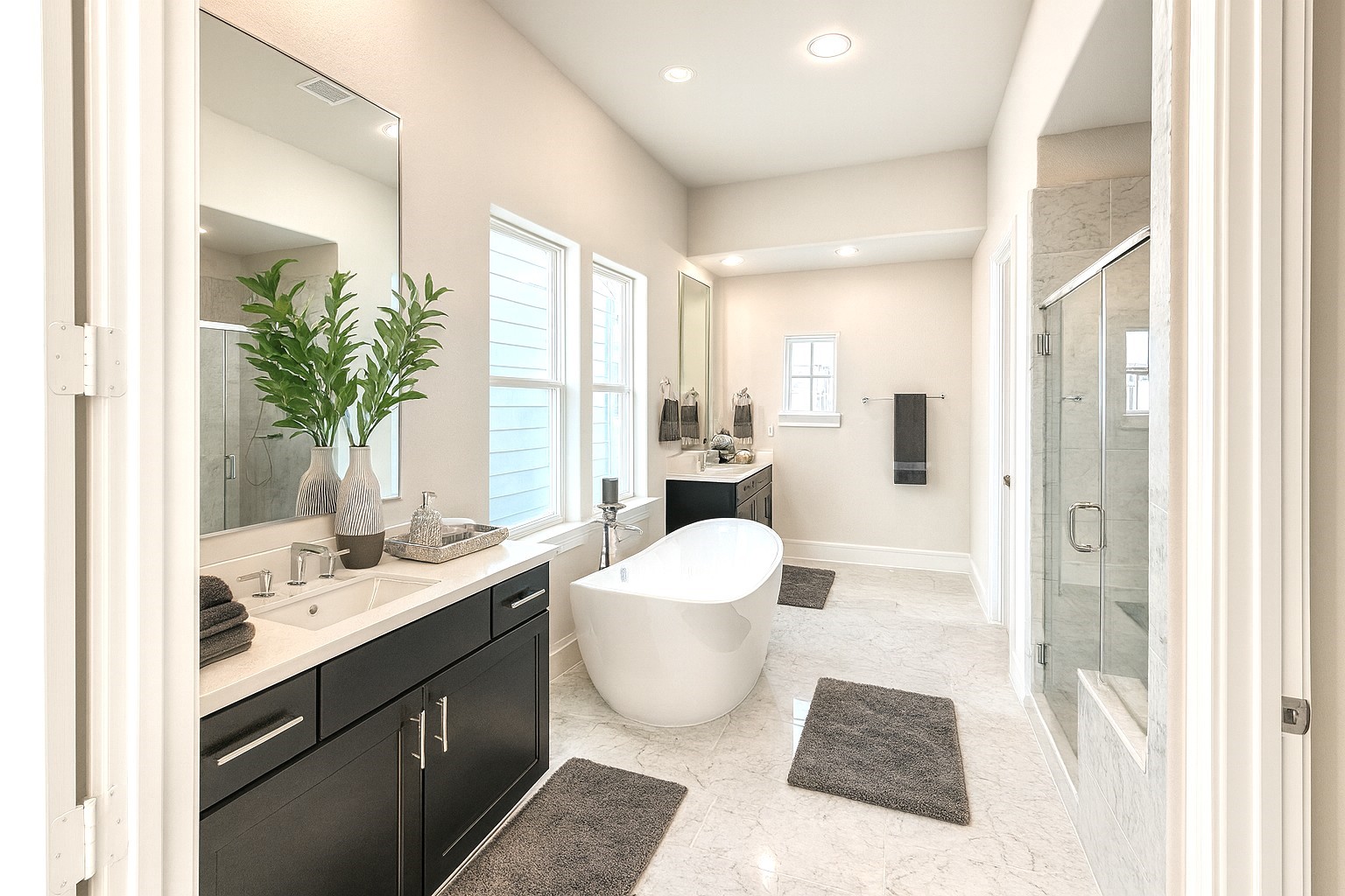 Gorgeous Bathroom w/ Separate Vanities - Free Standing Tub Picture Frames.  Separate Seated Shower.  Hans Grohe Plumbing Fixtures.  (picture was virtually staged)