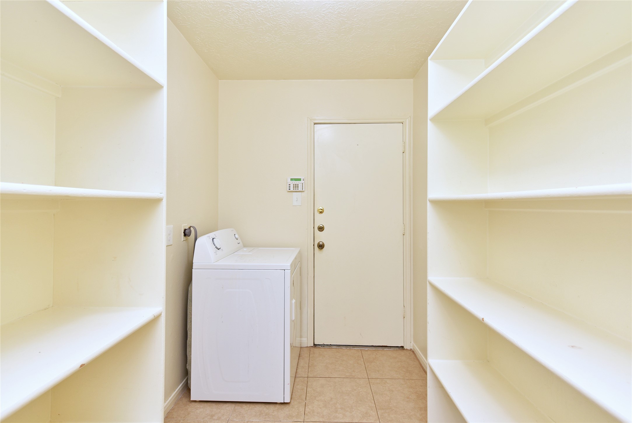 Large laundry room with nice storage