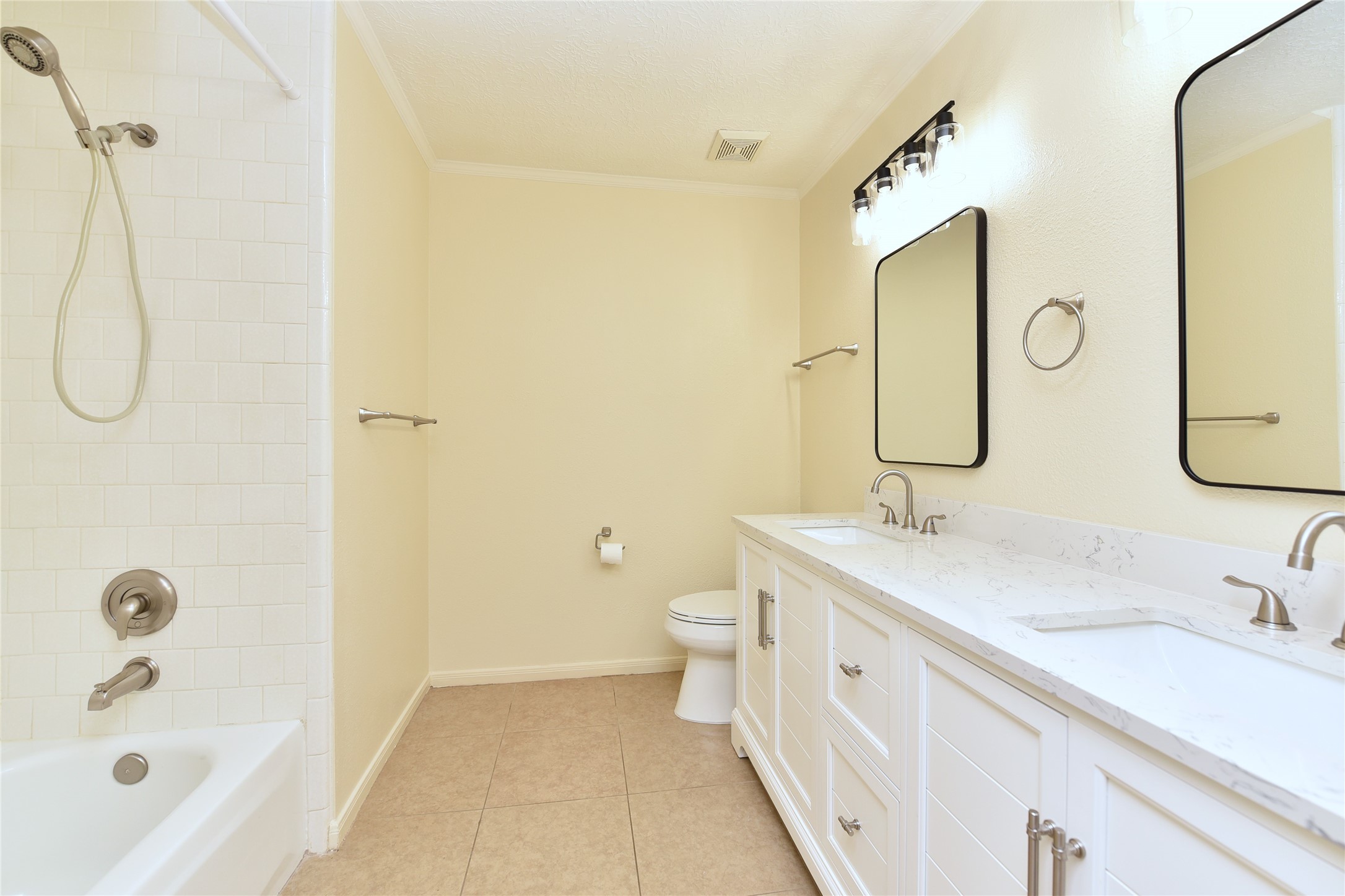 Full tub, shower and double sinks