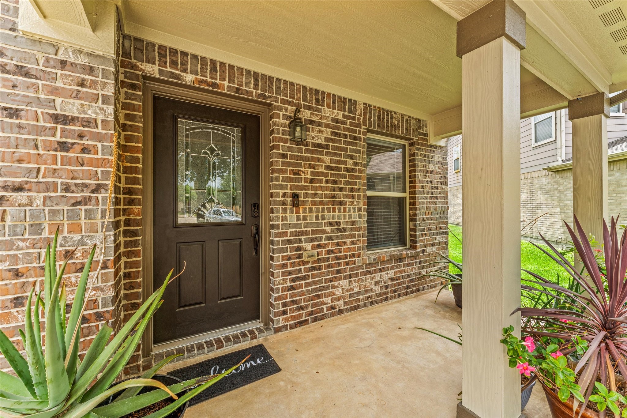 Covered front porch with welcoming entry