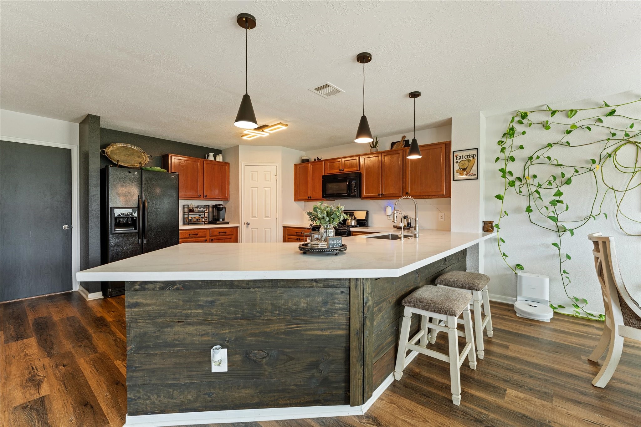 Bright kitchen with breakfast bar and prep space