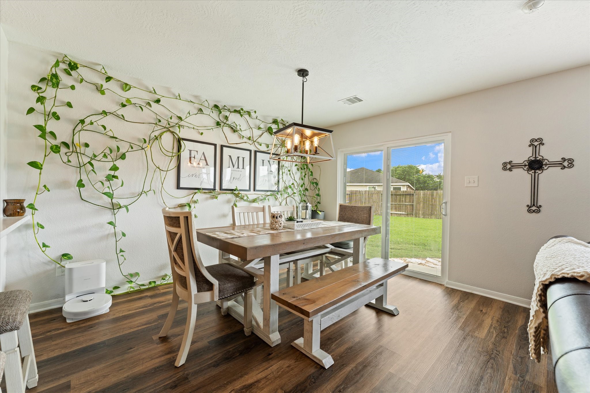 Bright breakfast nook with backyard view