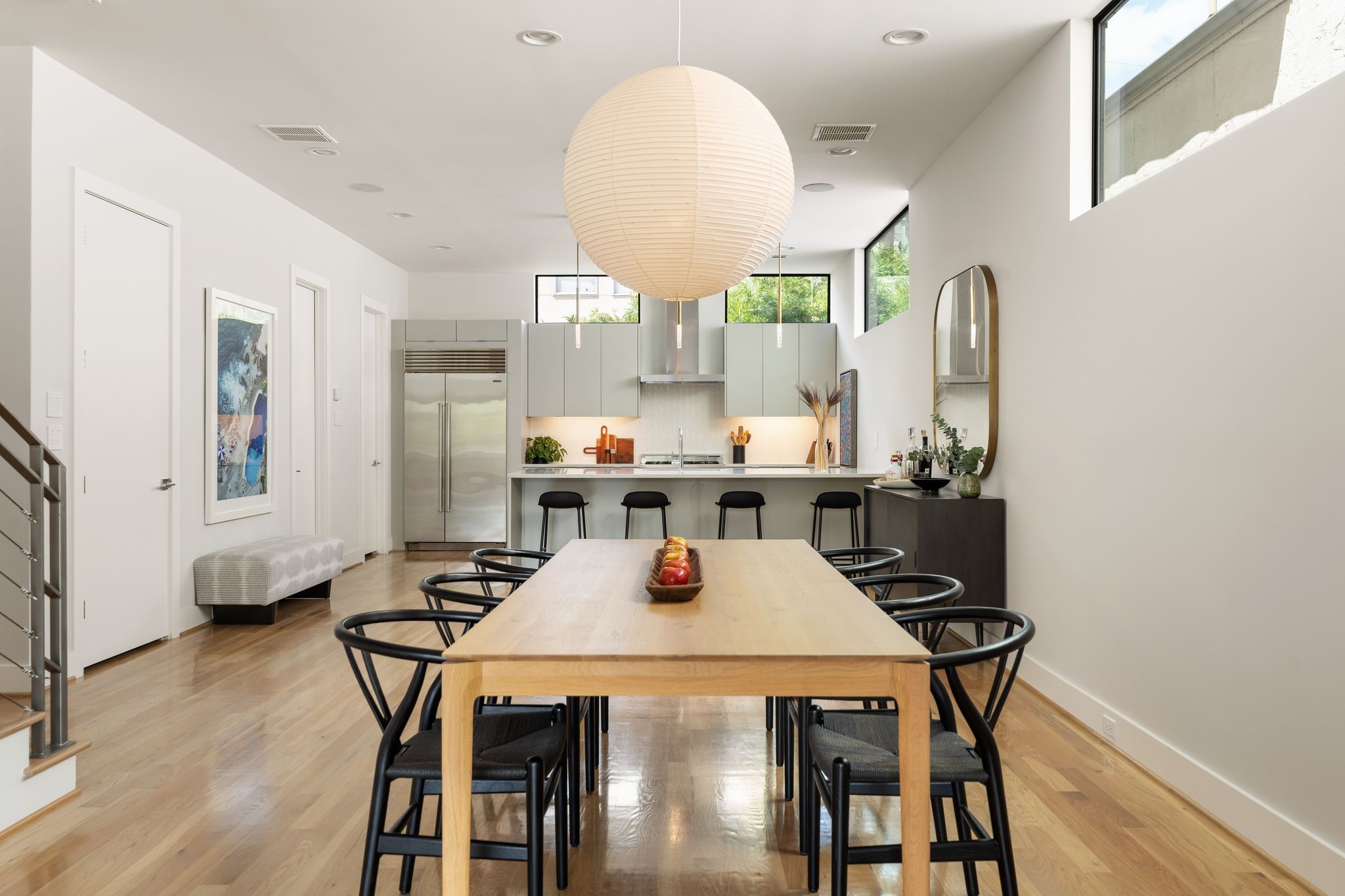 Dining room opens directly to the kitchen, emphasizing the thoughtful flow and connectivity of the homes primary living level.