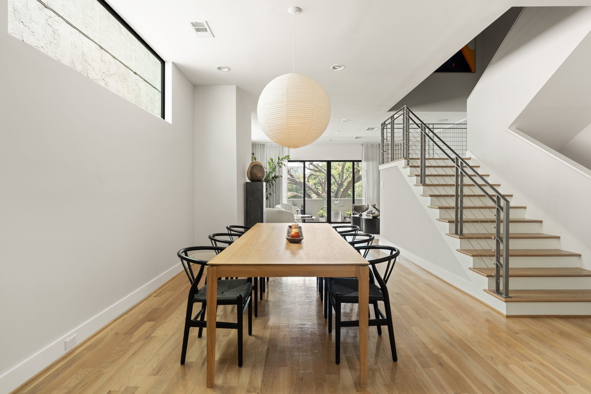 Centrally positioned dining room seamlessly connects the kitchen and living spaces, creating a natural setting for entertaining.