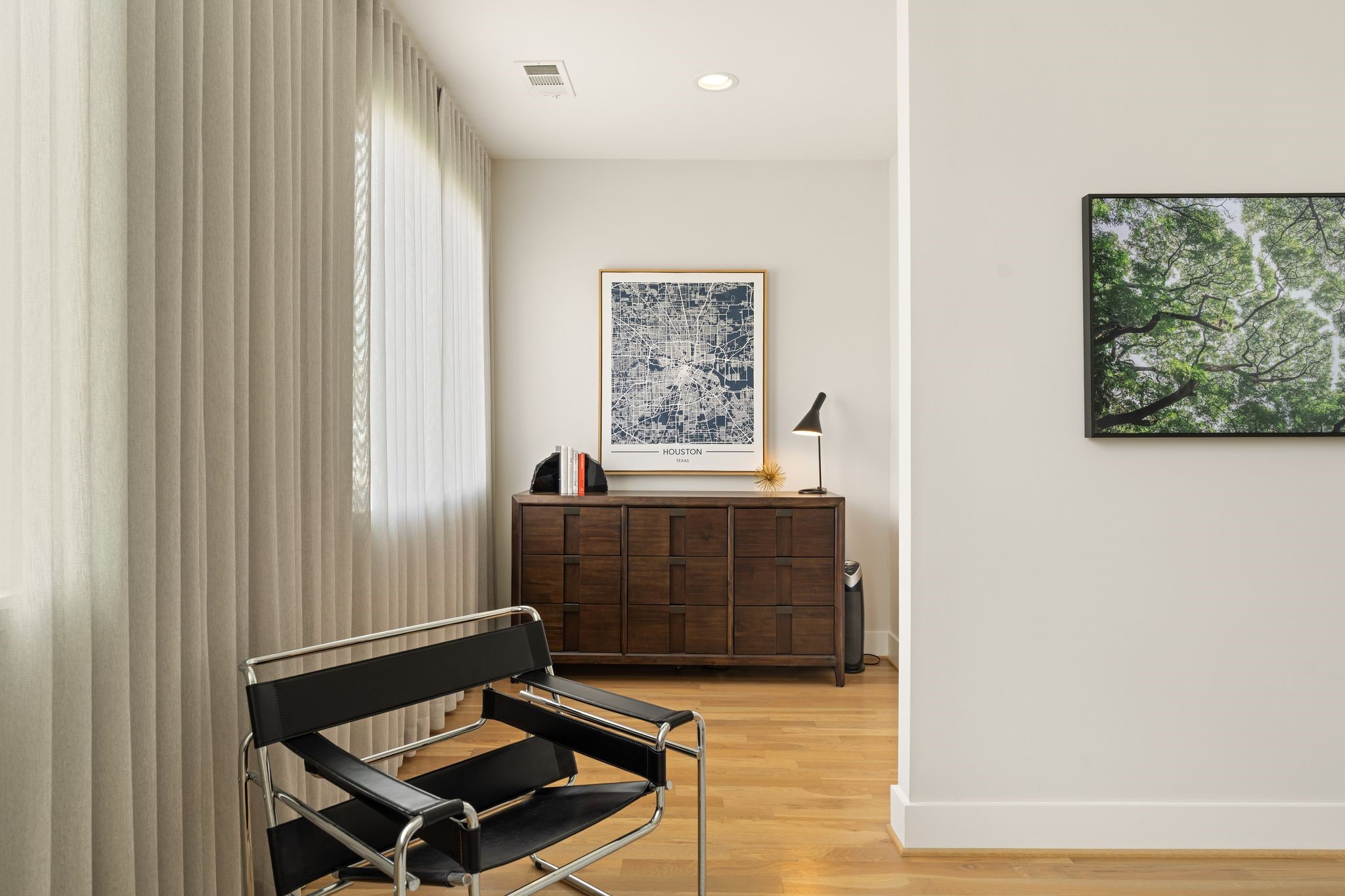 Flexible sitting area within the primary suite offers an ideal setting for a home office, reading retreat, fitness space, or Peloton. Flexible sitting area within the primary suite offers an ideal setting for a home office, reading retreat, fitness space, or Peloton.