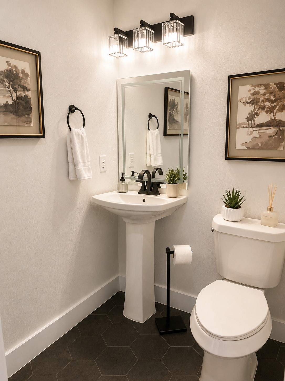 half bath on second floor adjacent to open concept kitchen and living room.