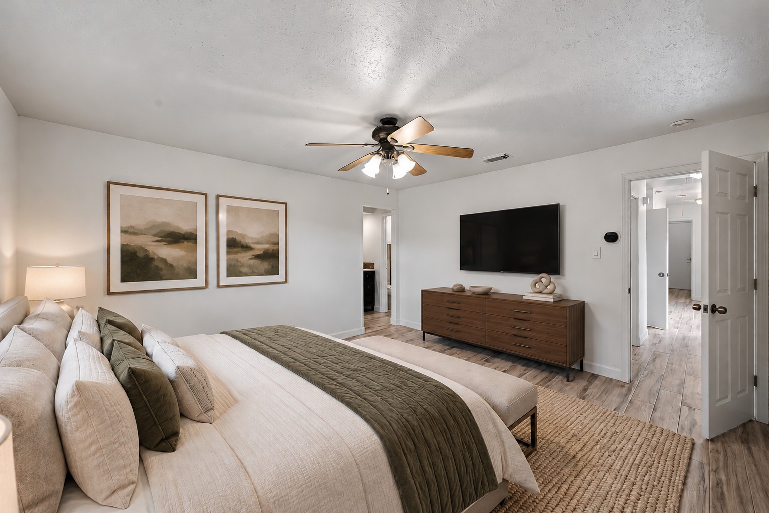 Virtually Staged: The smart layout connects smoothly to the adjoining primary bath, creating an inviting, well-appointed private haven