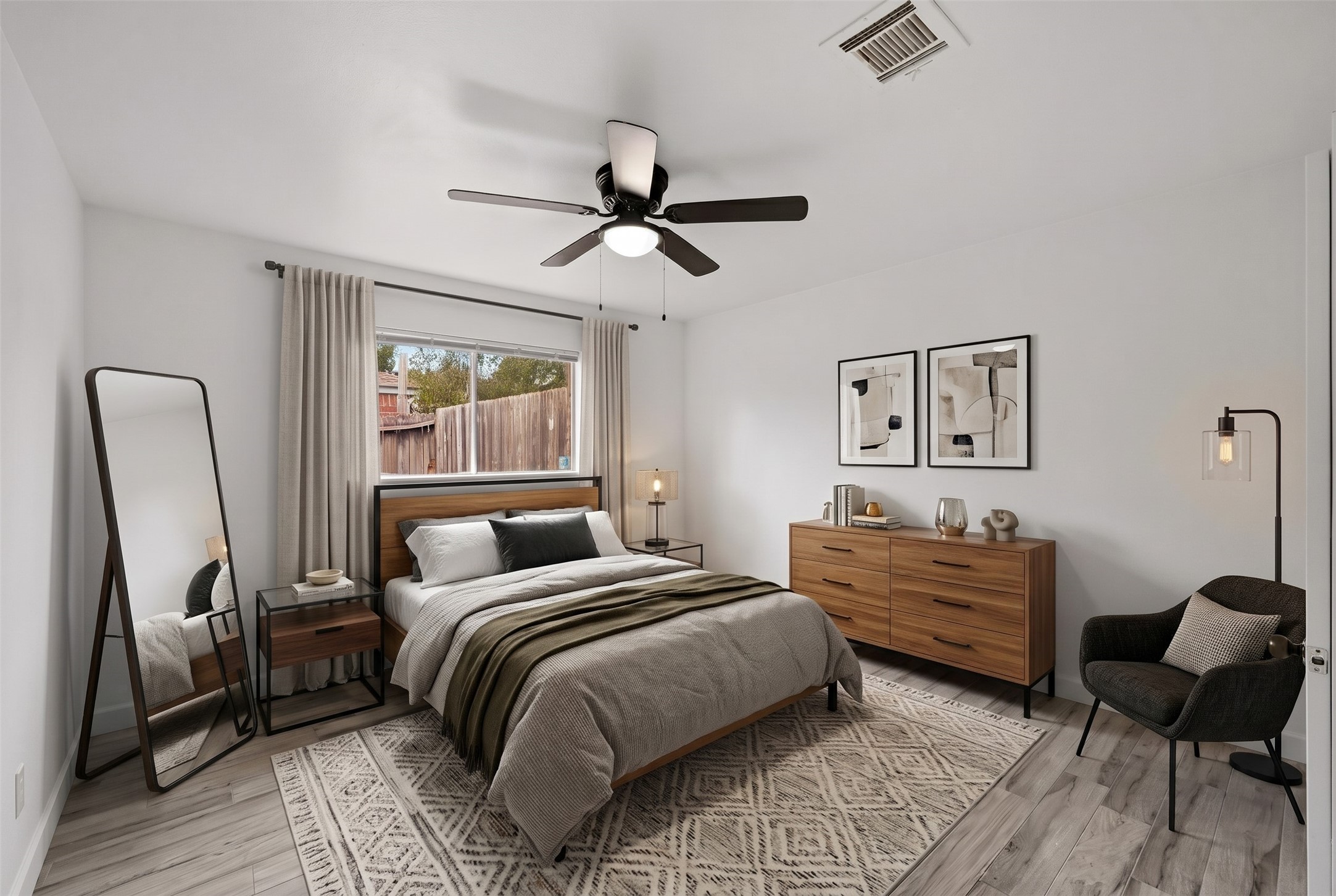 Virtually Staged: This comfortable secondary bedroom offers a generous, well-balanced footprint designed for restful relaxation and everyday versatility