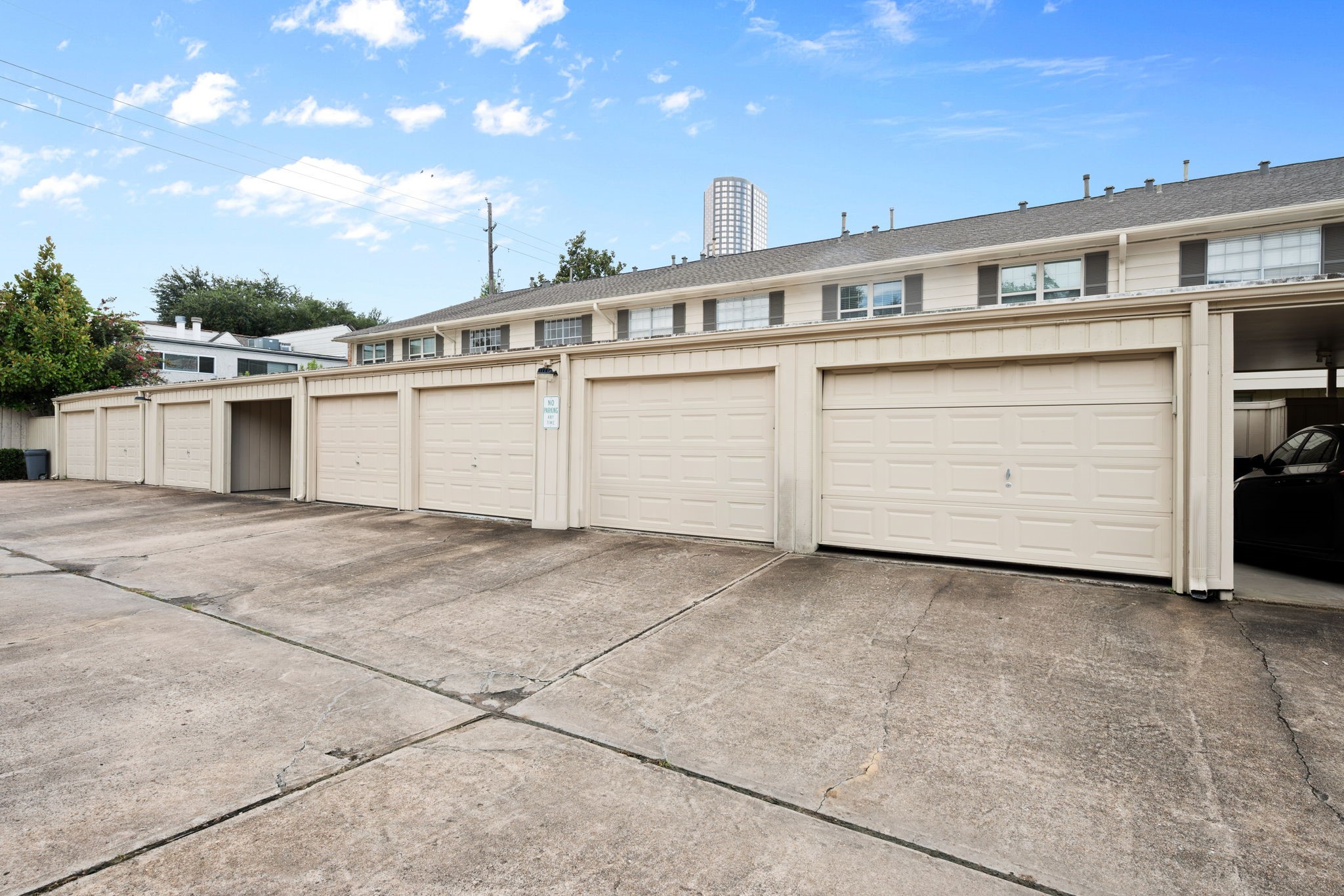 Spacious and convenient multiple-car garage area, ideal for secure vehicle storage, situated in a well-maintained residential complex.