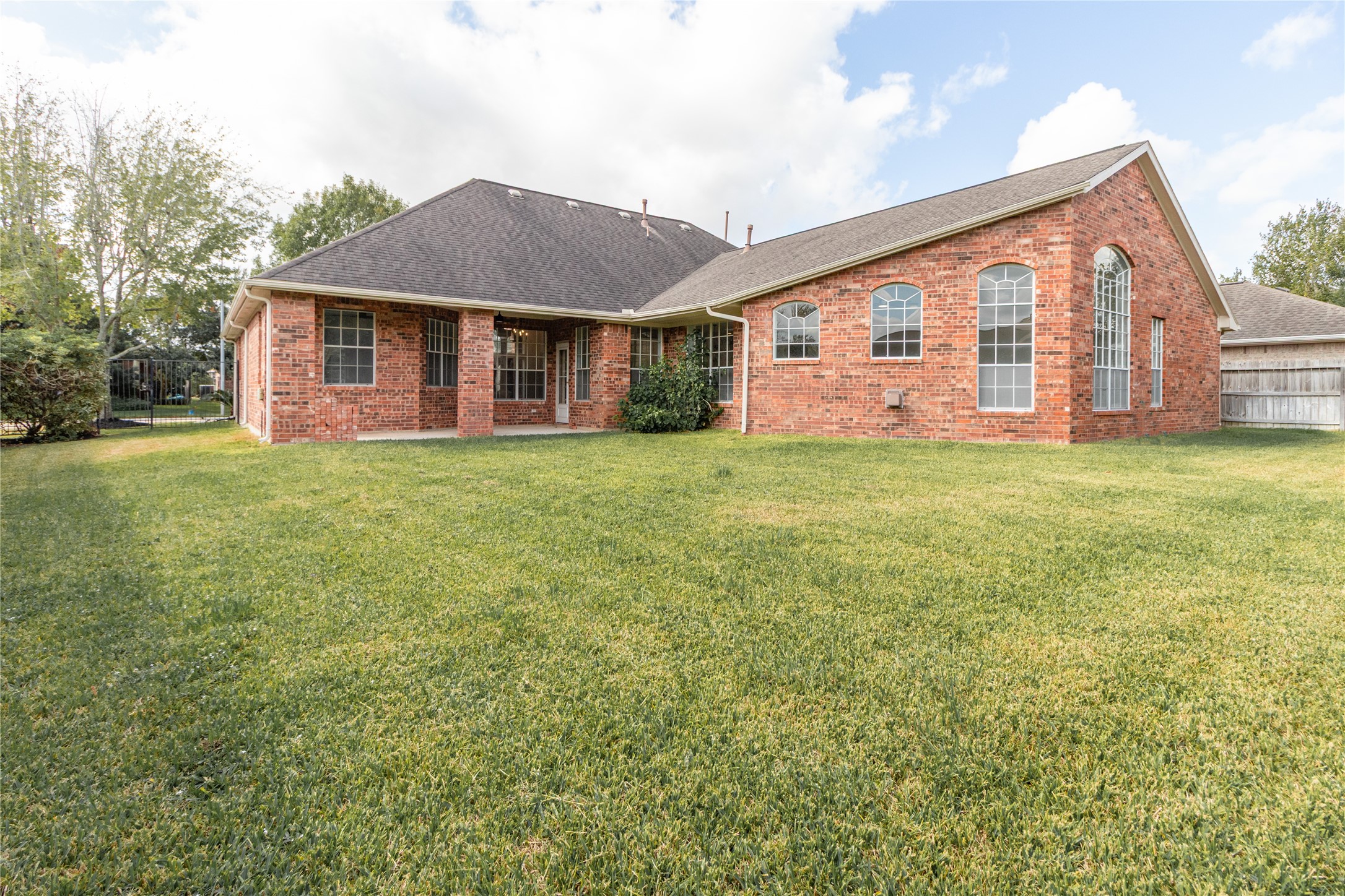 This corner lot offers a large backyard with plenty of space for adding a swimming pool if you like.