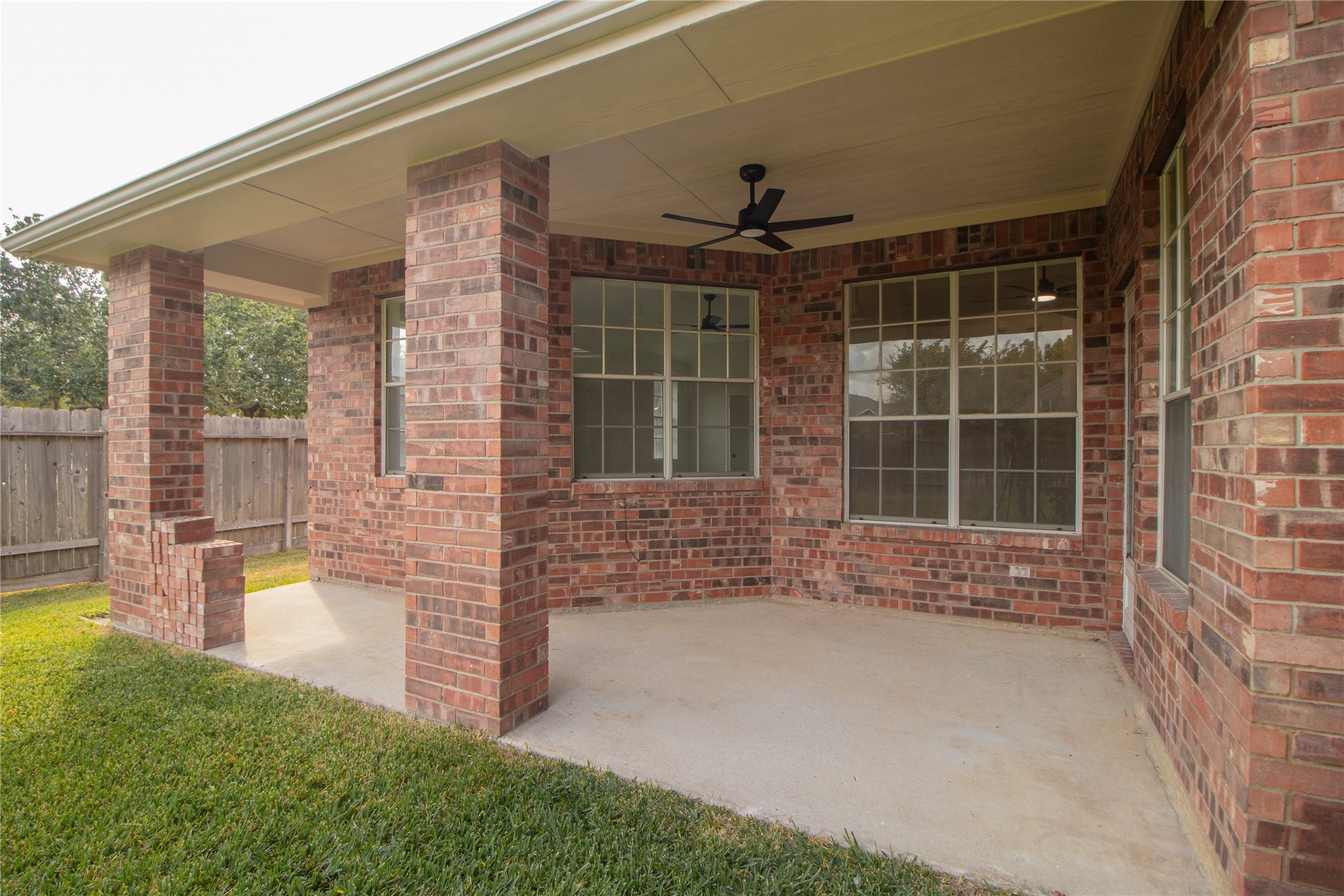 Large covered patio. Nice area to entertain and cook out.