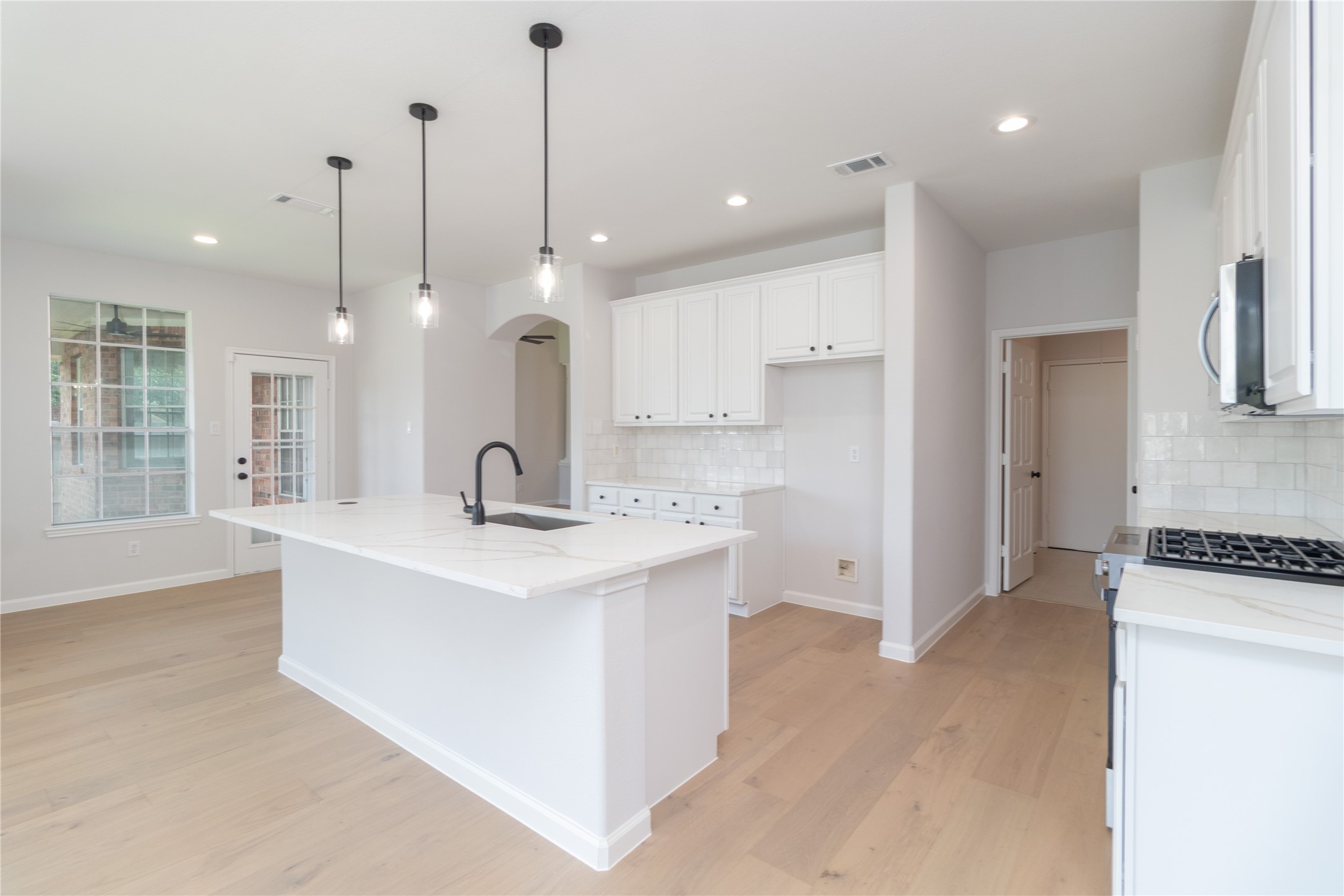 Another angle of the updated kitchen, offering a clean, modern look.