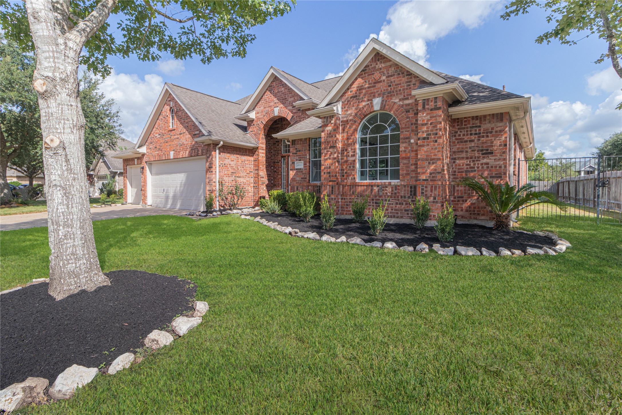 Updated landscaping with mature trees in the yard. Updated landscaping with mature trees in the yard.