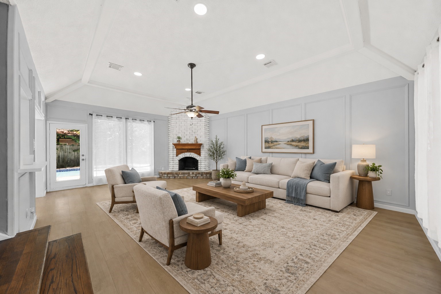 Virtually Staged inviting transitional living room with fireplace