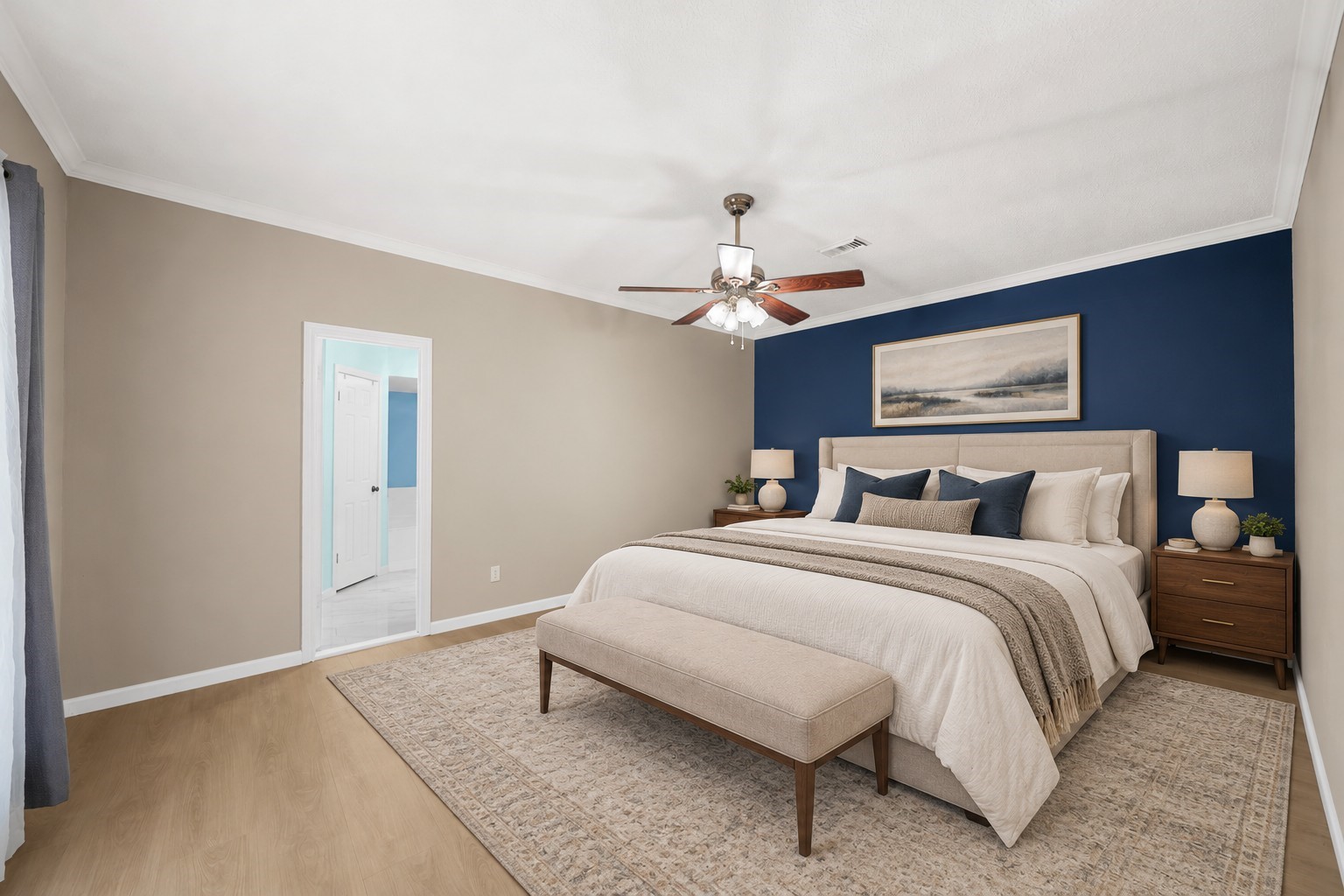 VS Primary king bed on navy accent wall