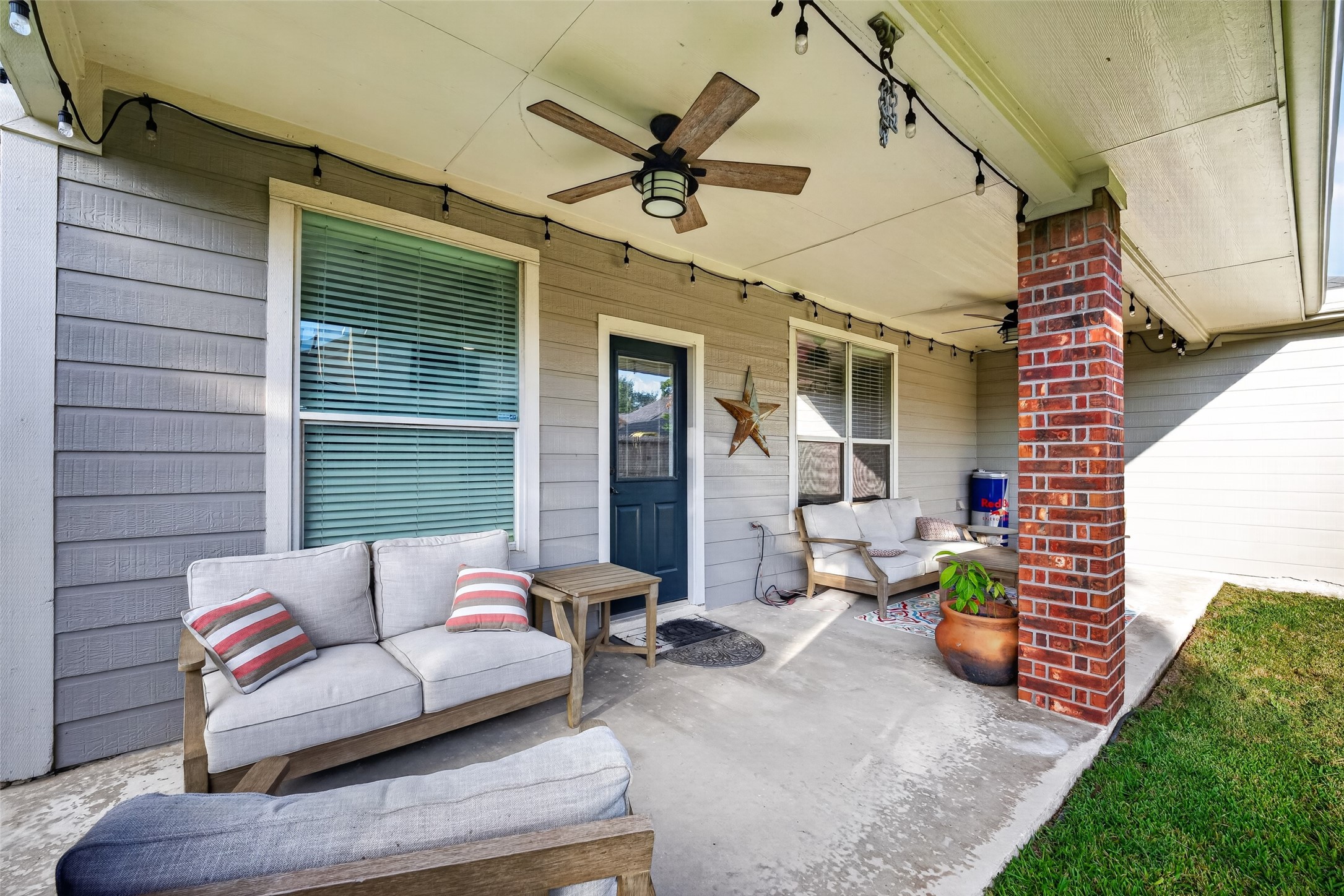 Covered patio with brick columns  your outdoor living room.