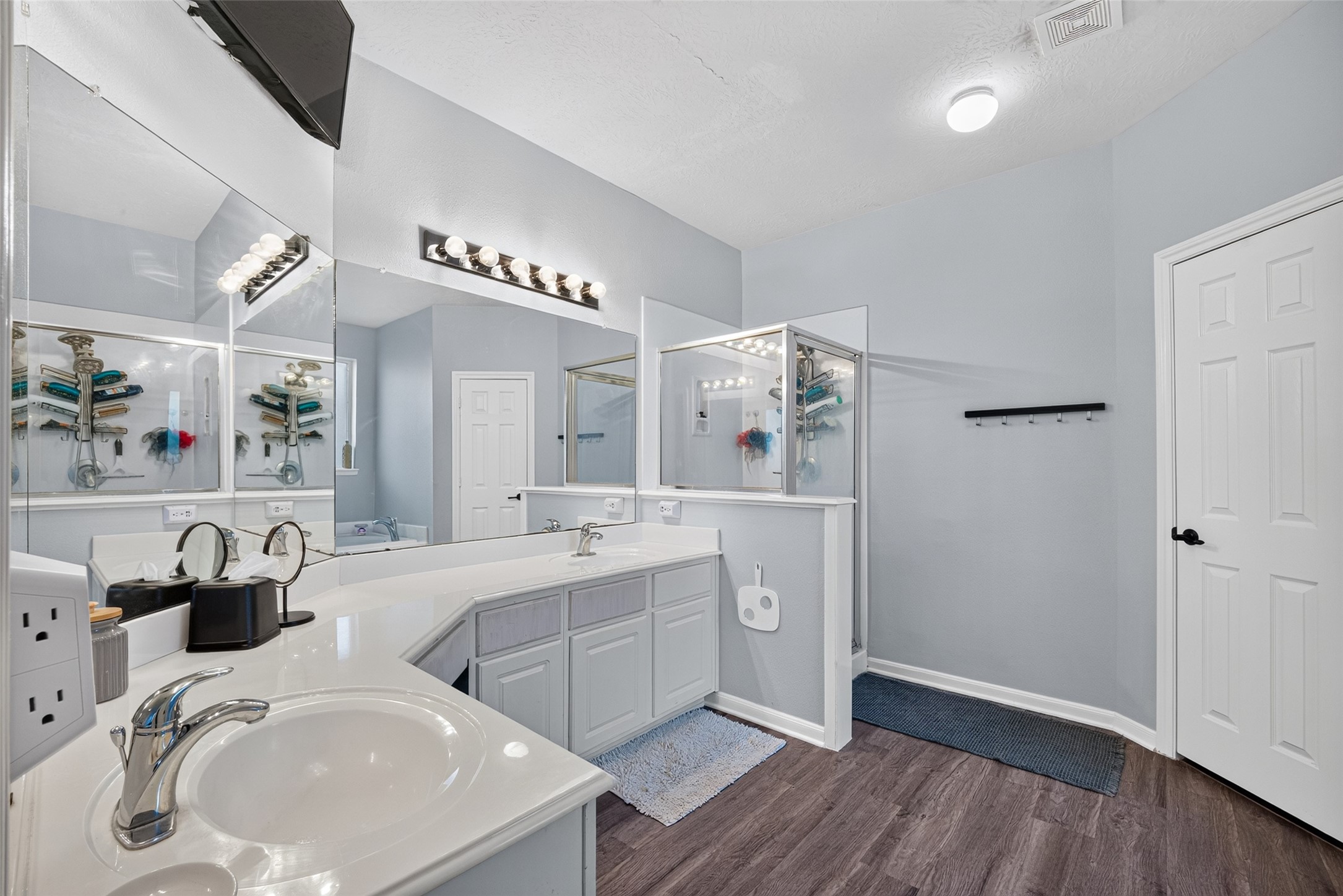 Spa-like primary bath with double vanity.