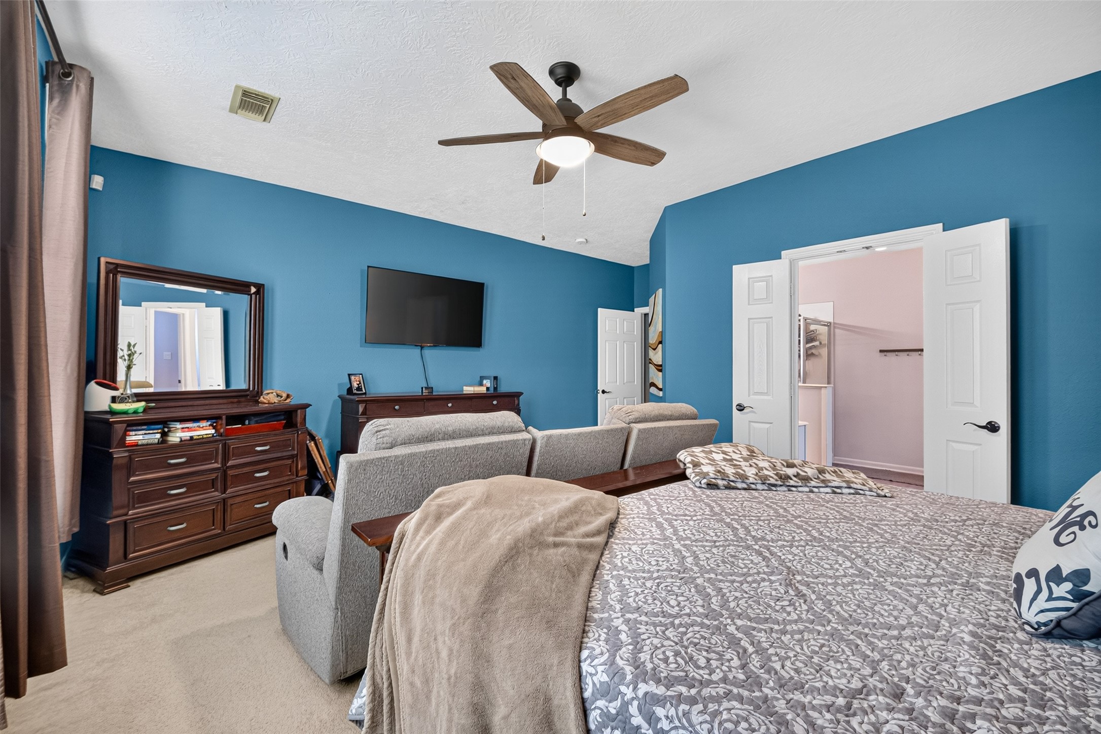 Serene primary bedroom  your private getaway.