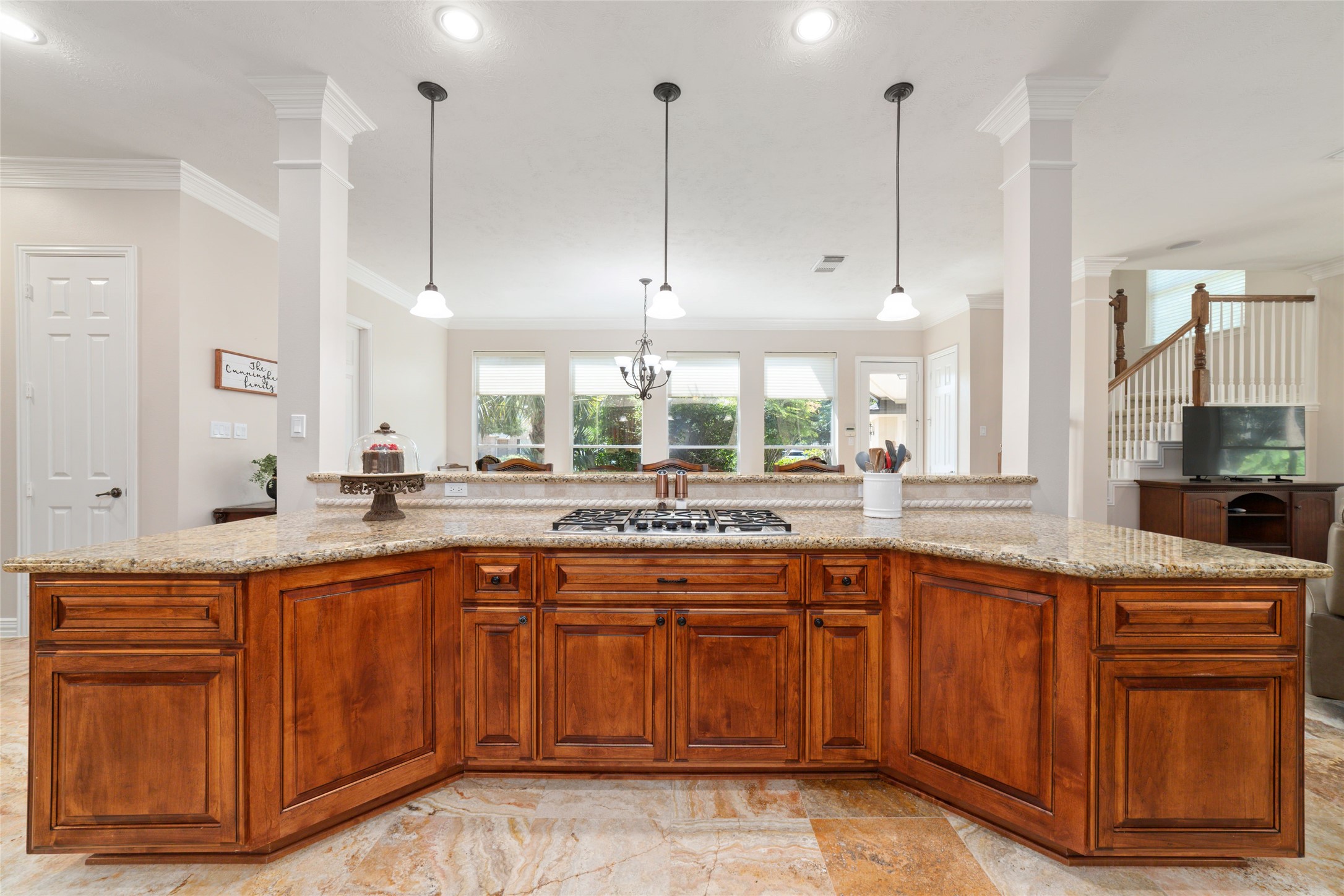 Granite countertop featuring a built-in cooktop.