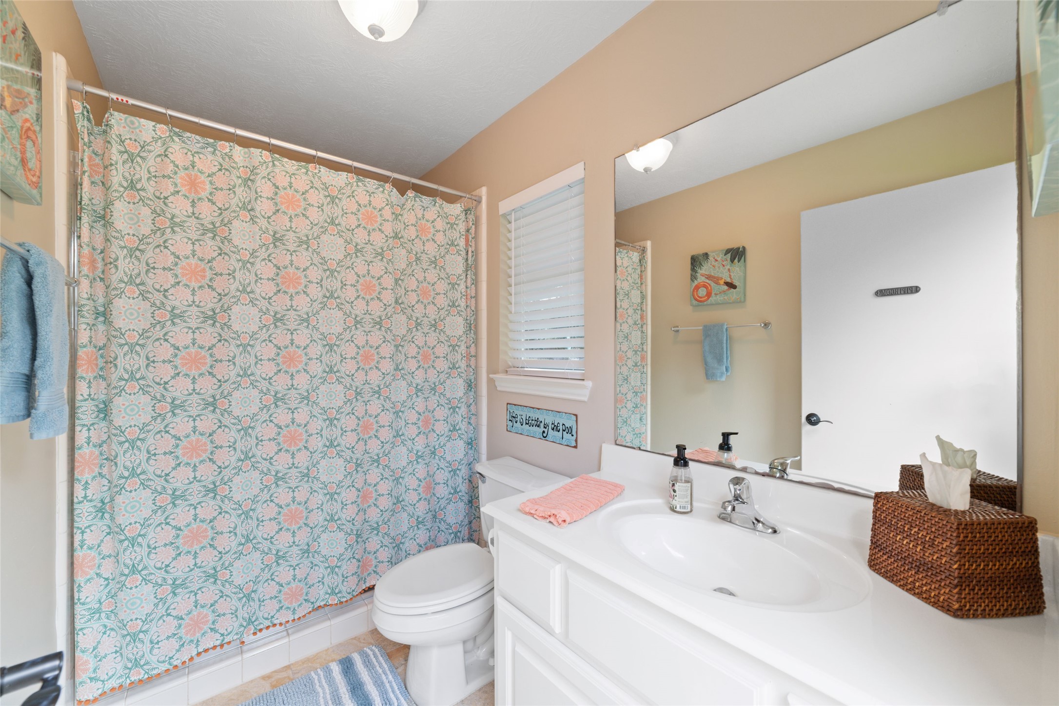 There is a full bathroom located off the garage.