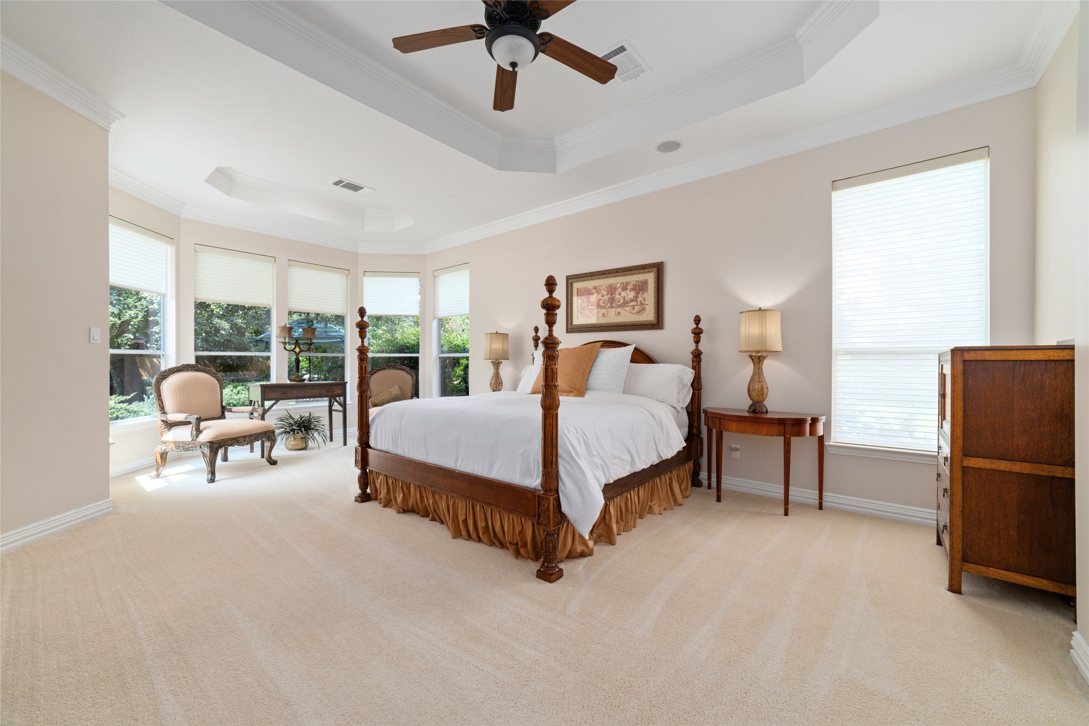 Primary bedroom with bay window to enjoy the backyard view