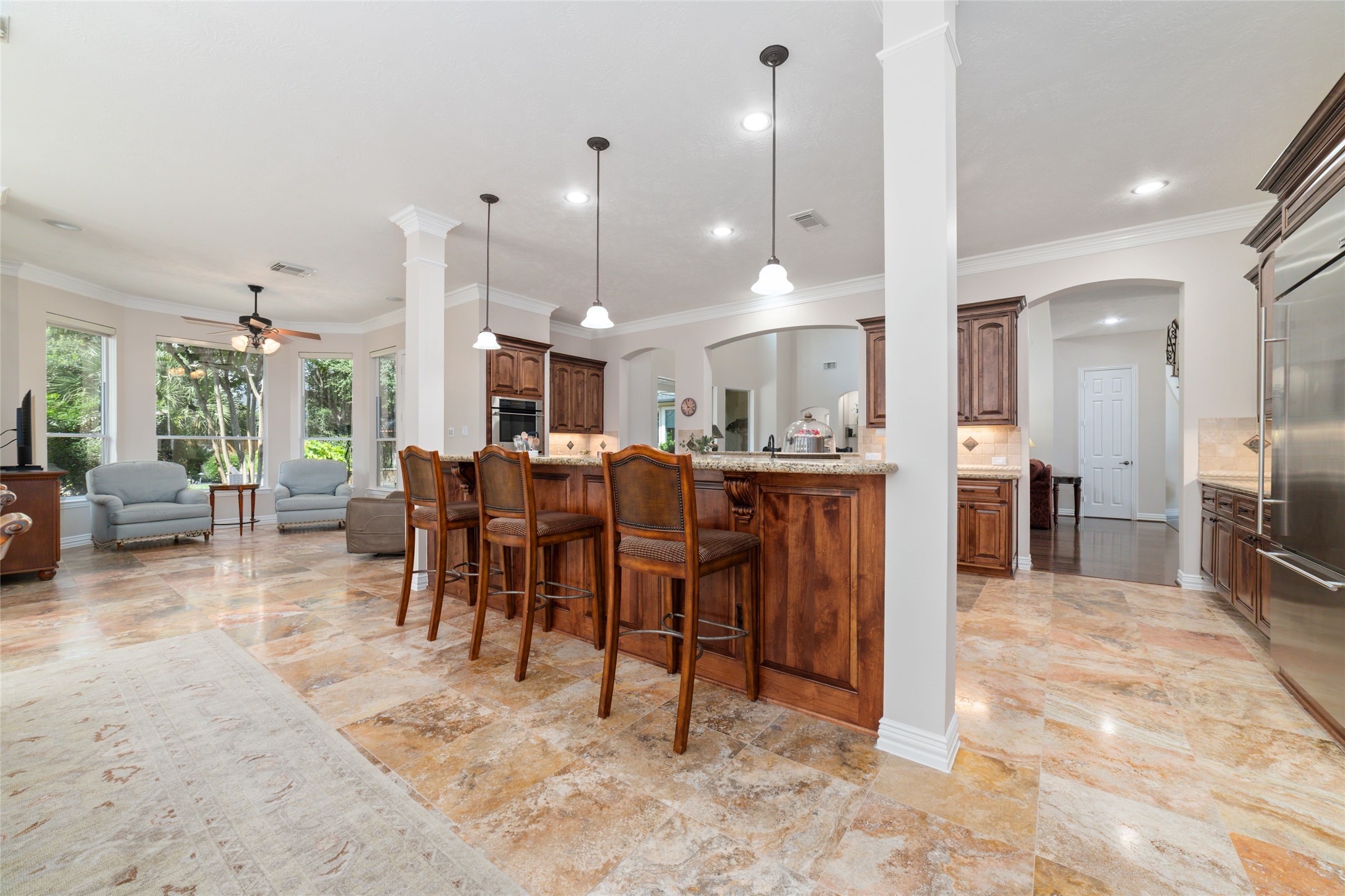 The area features a cozy sitting area with comfortable seating, perfect for entertaining or family gatherings.