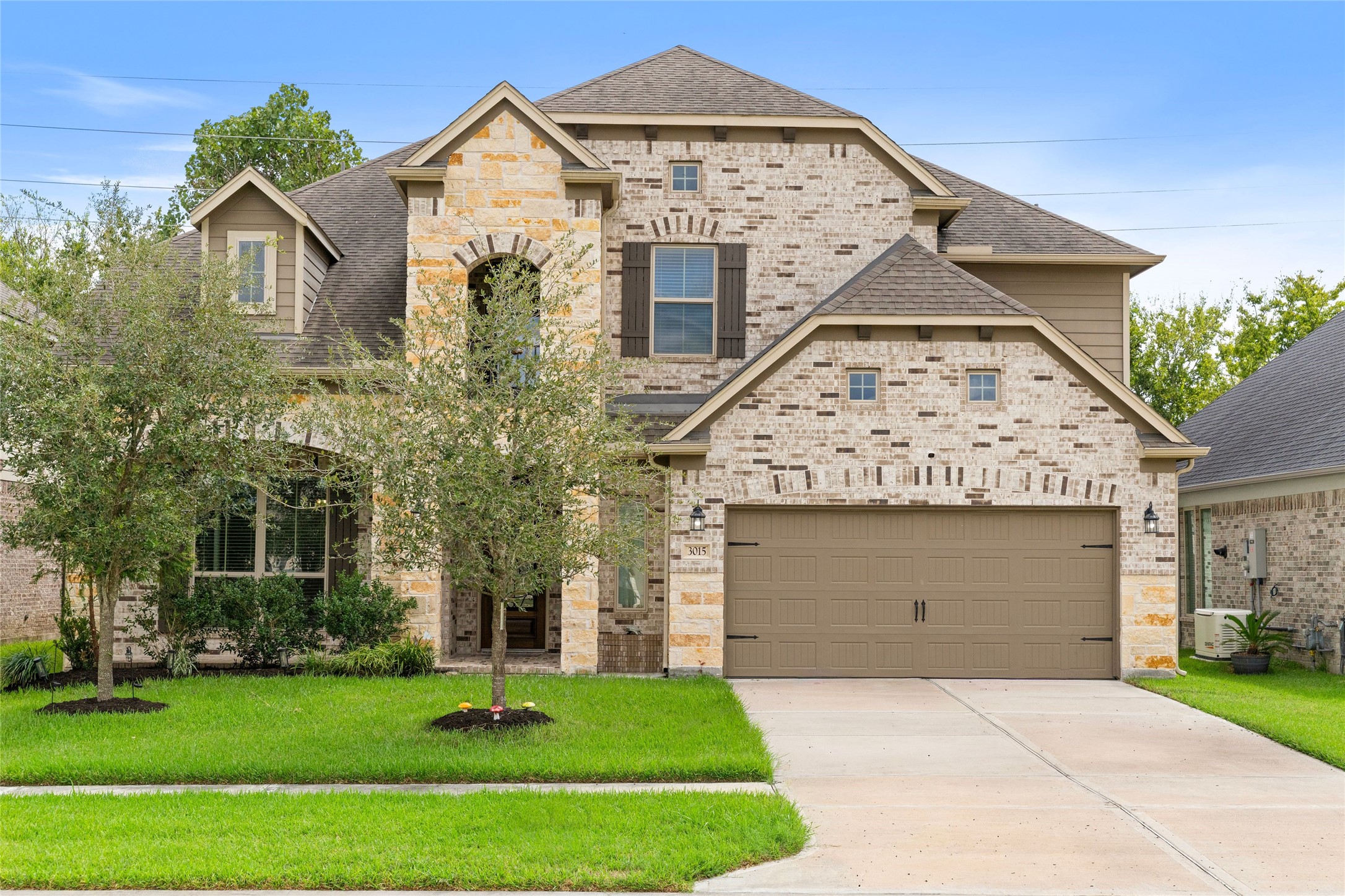 Beautiful curb appeal in gated Briarwood Crossing