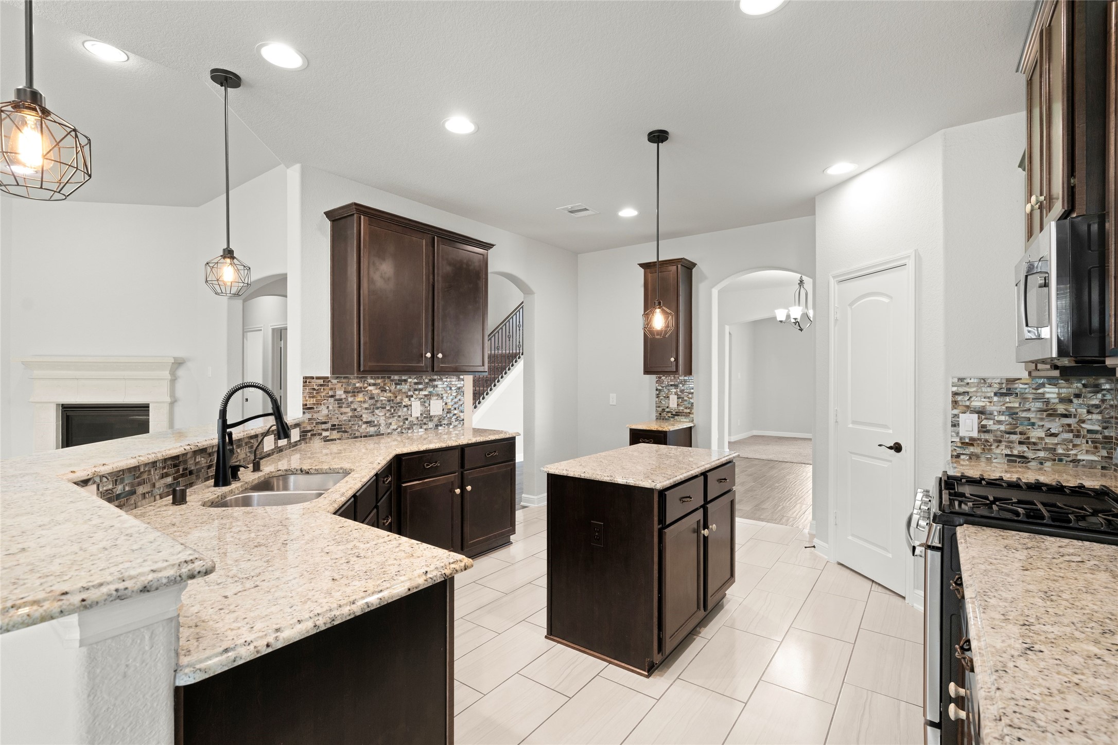 Kitchen with pendant lighting and breakfast bar