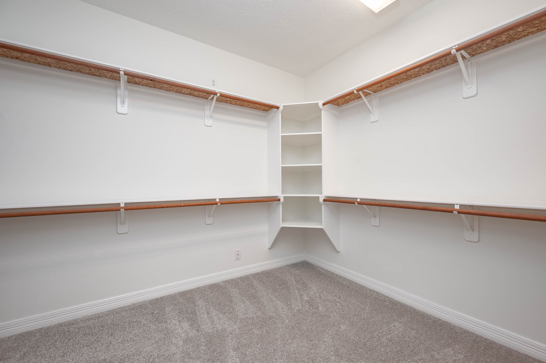 Primary bedroom walk in closet is huge