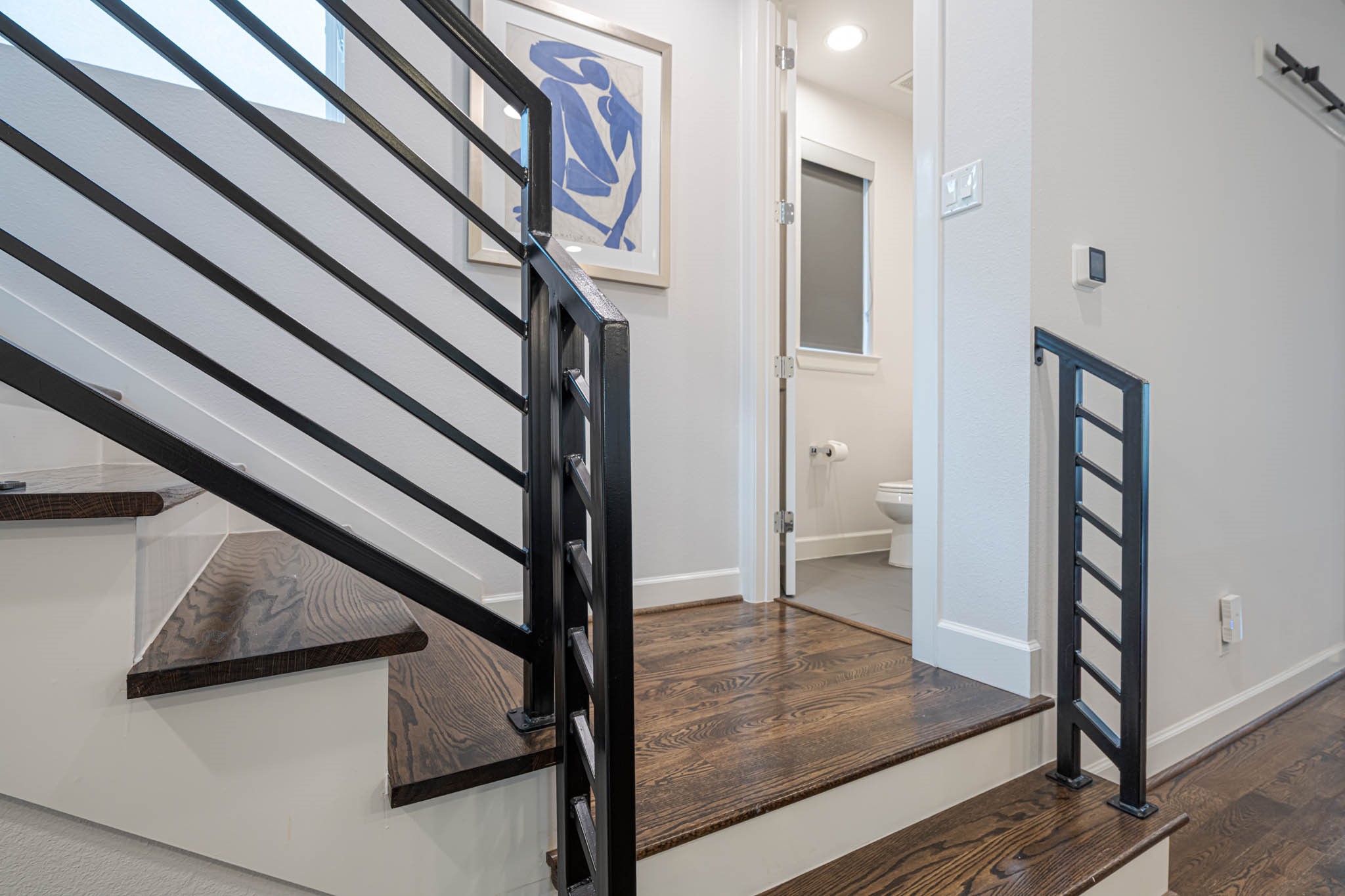 Ascend to the third floor and discover the serene primary bedroom, offering a private retreat with modern elegance.