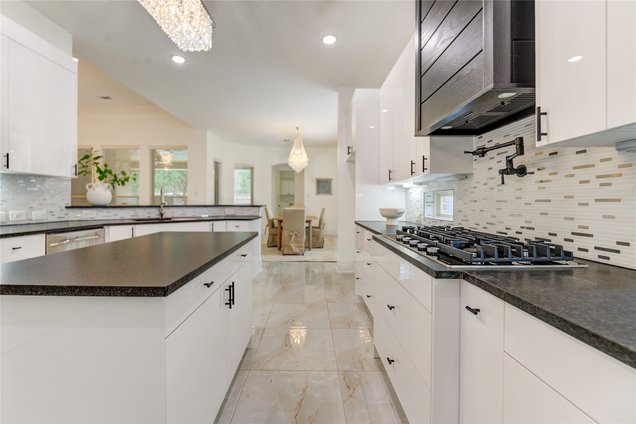 A spacious island ideal for entertaining, enhanced by a convenient pot filler.