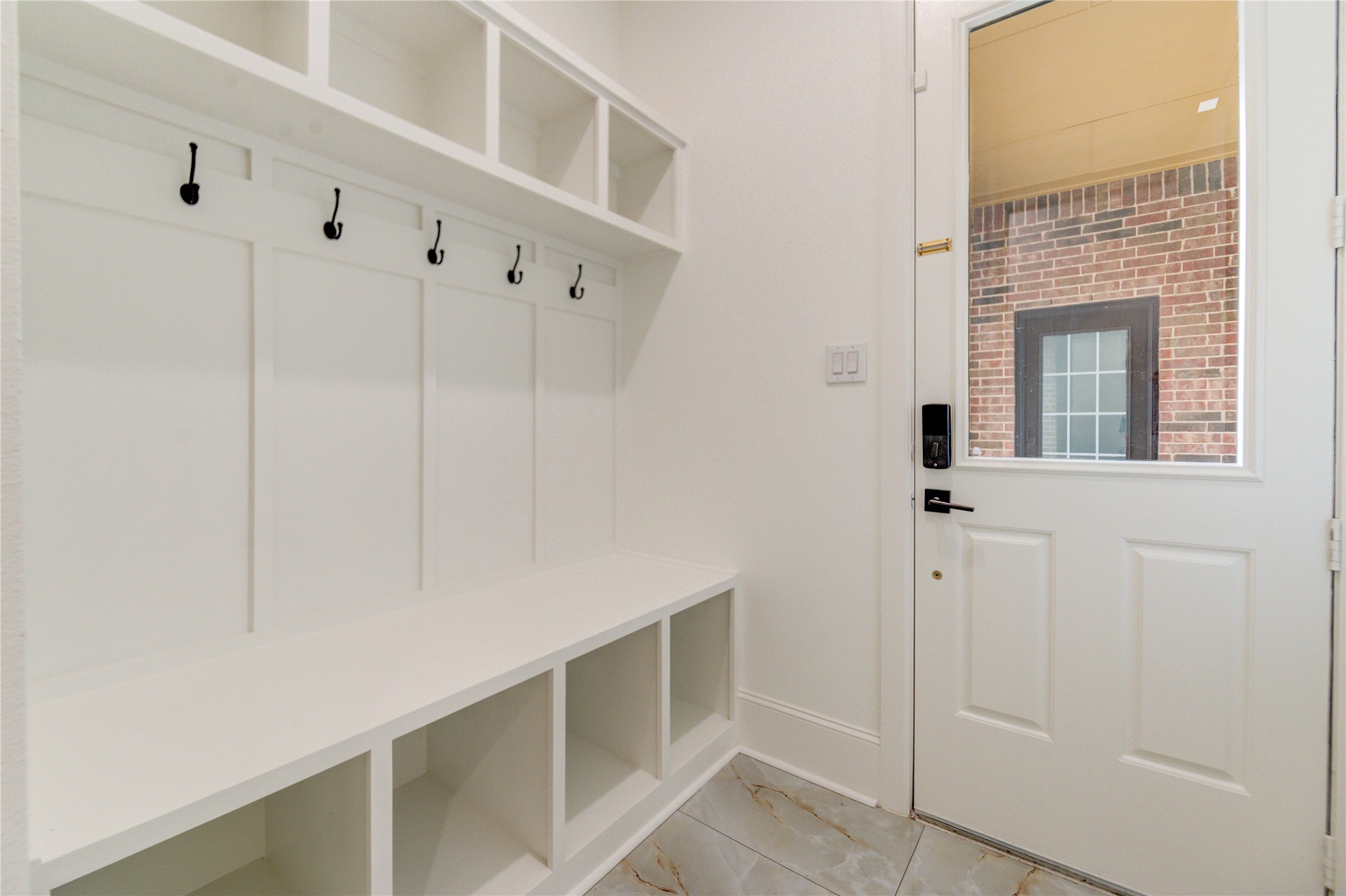 A well-designed mudroom with thoughtful storage solutions to keep your home organized and clutter-free.