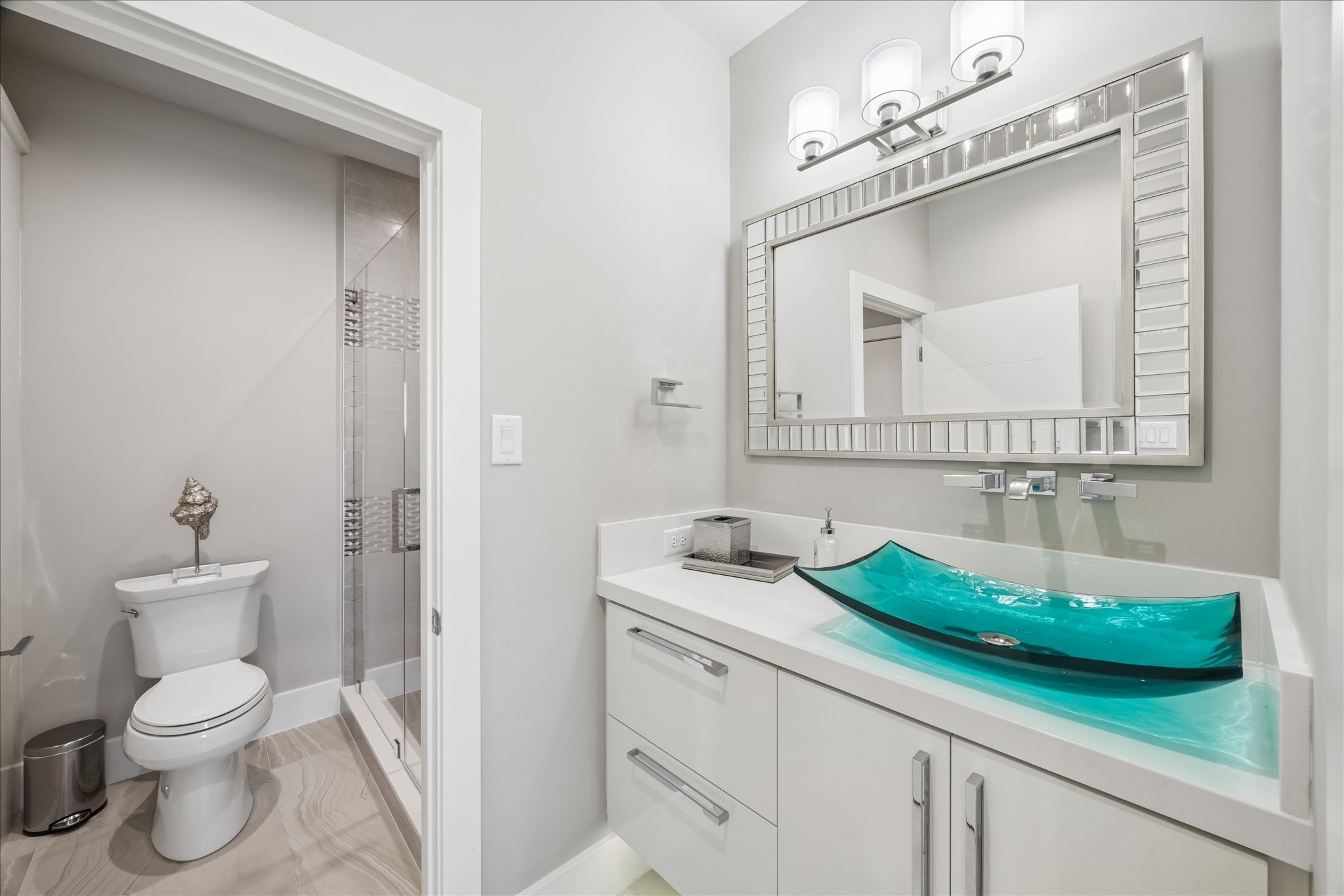 The secondary vanity with access to second level family room