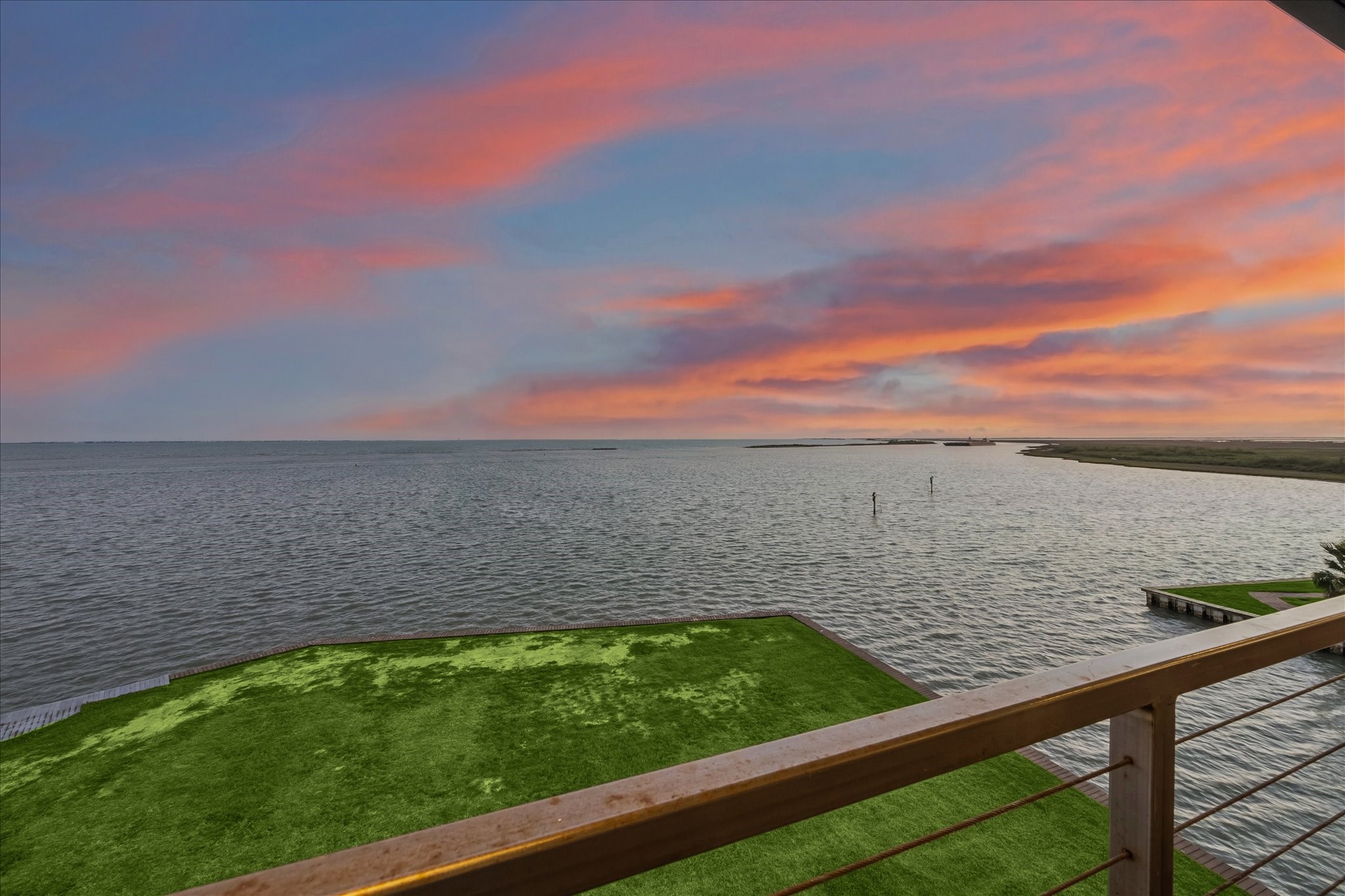 Second level balcony views of West Galveston Bay and the Intracoastal Waterway