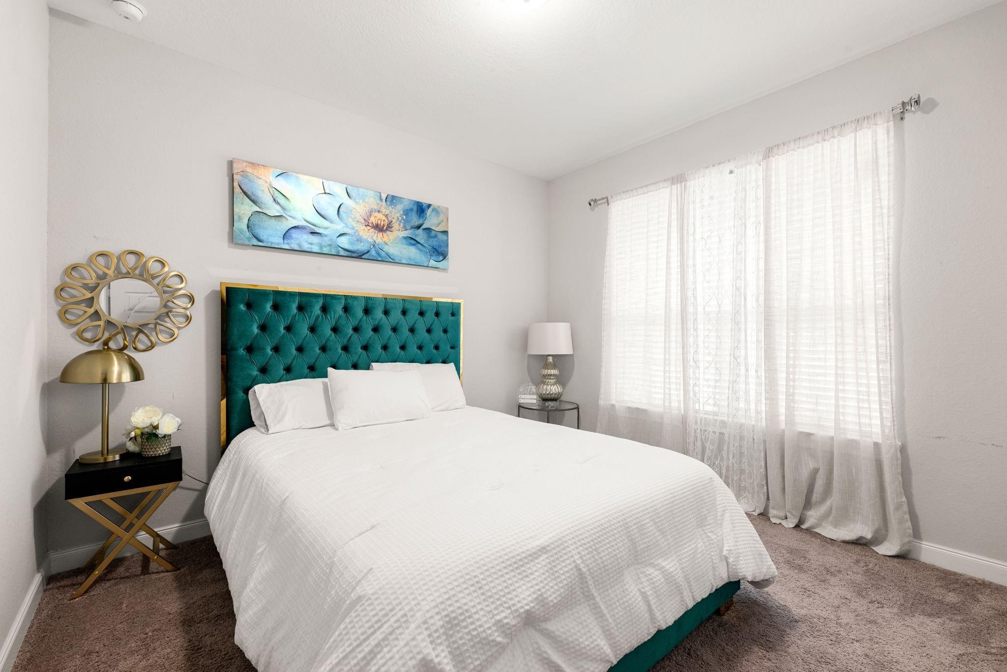 Located on the first floor, this versatile bedroom is ideal for guests.