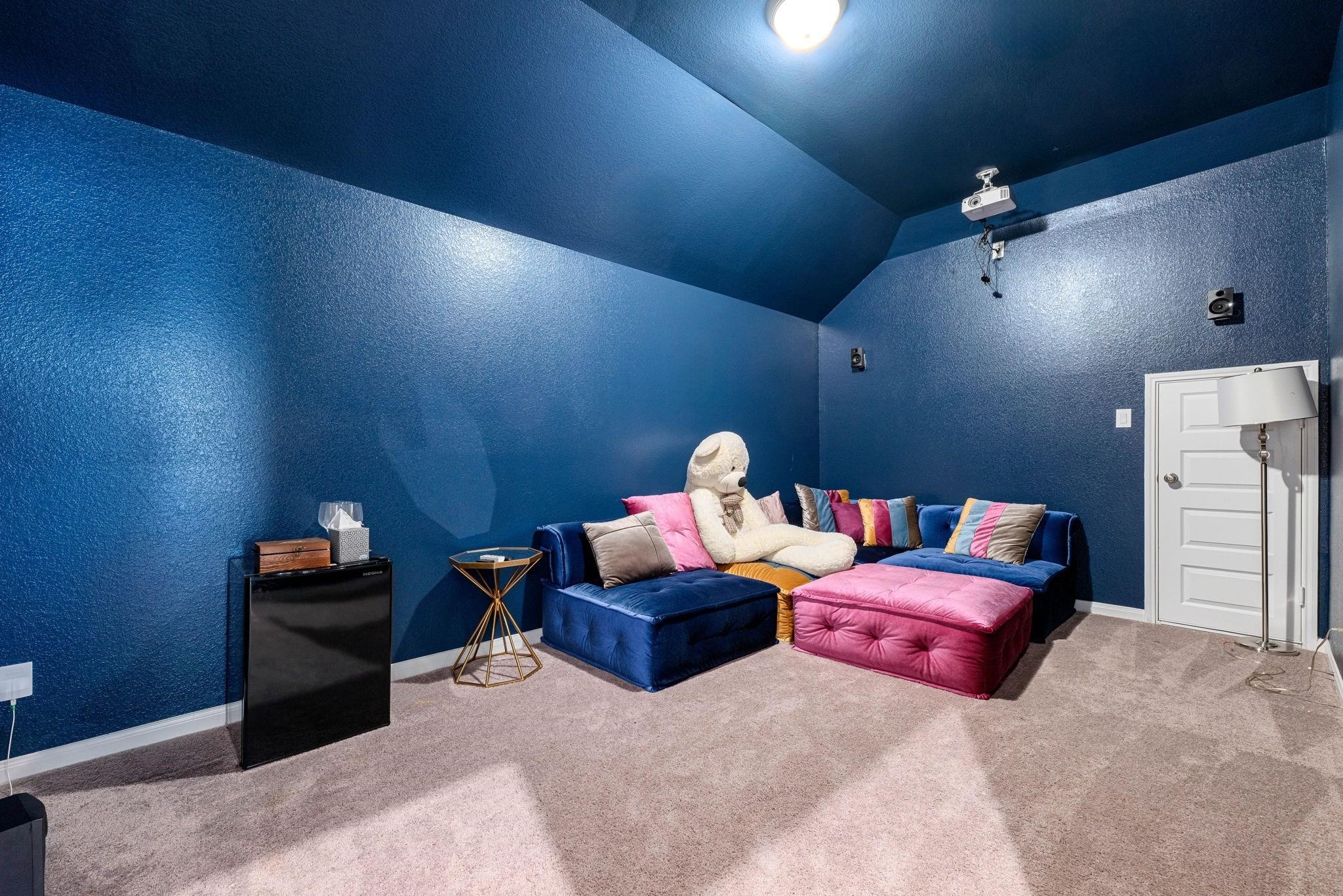 An enclosed, cozy space that works perfectly as a dedicated movie room or home theater.