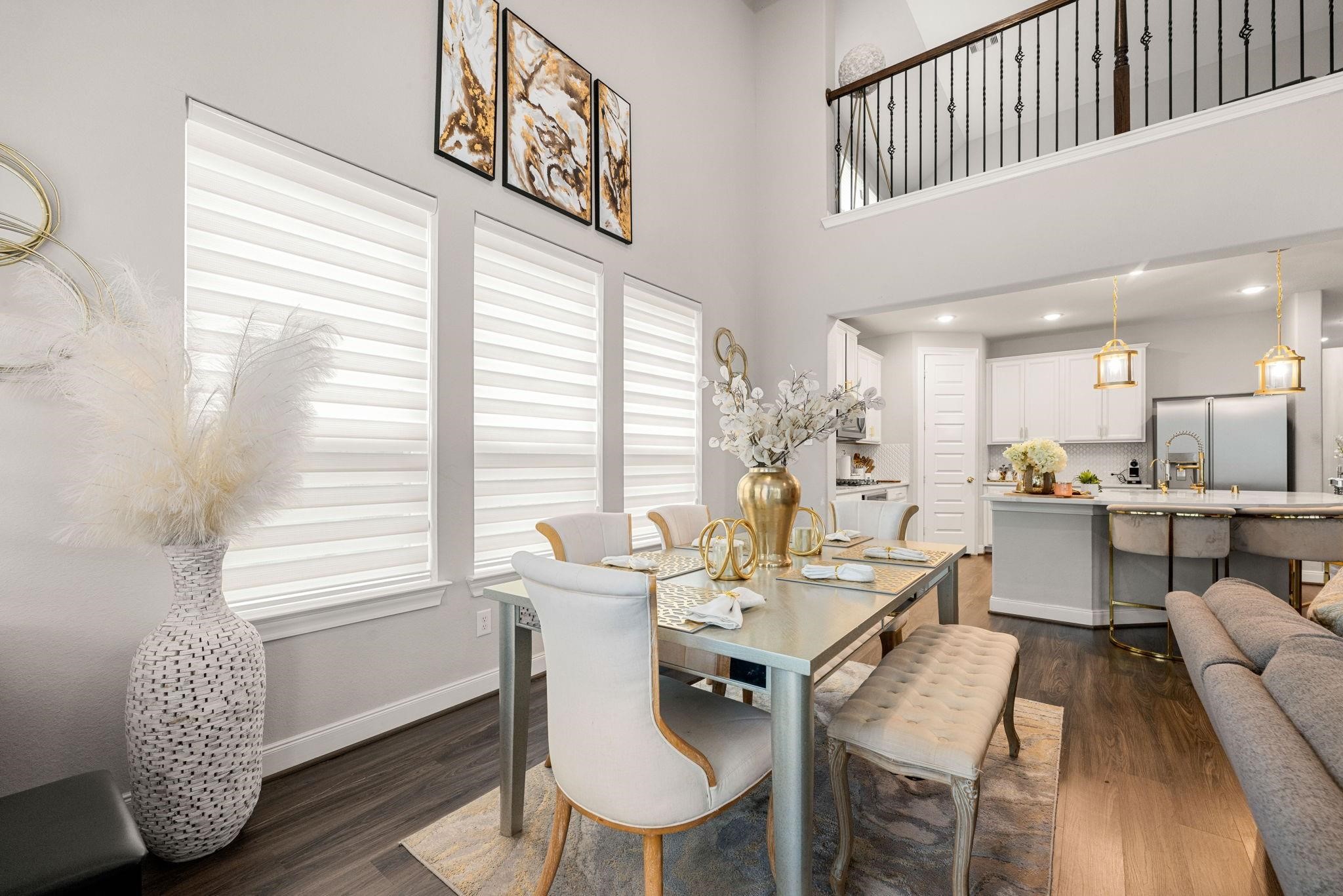 Sitting right by the kitchen and living room, this elegant dining area makes meals together effortless.