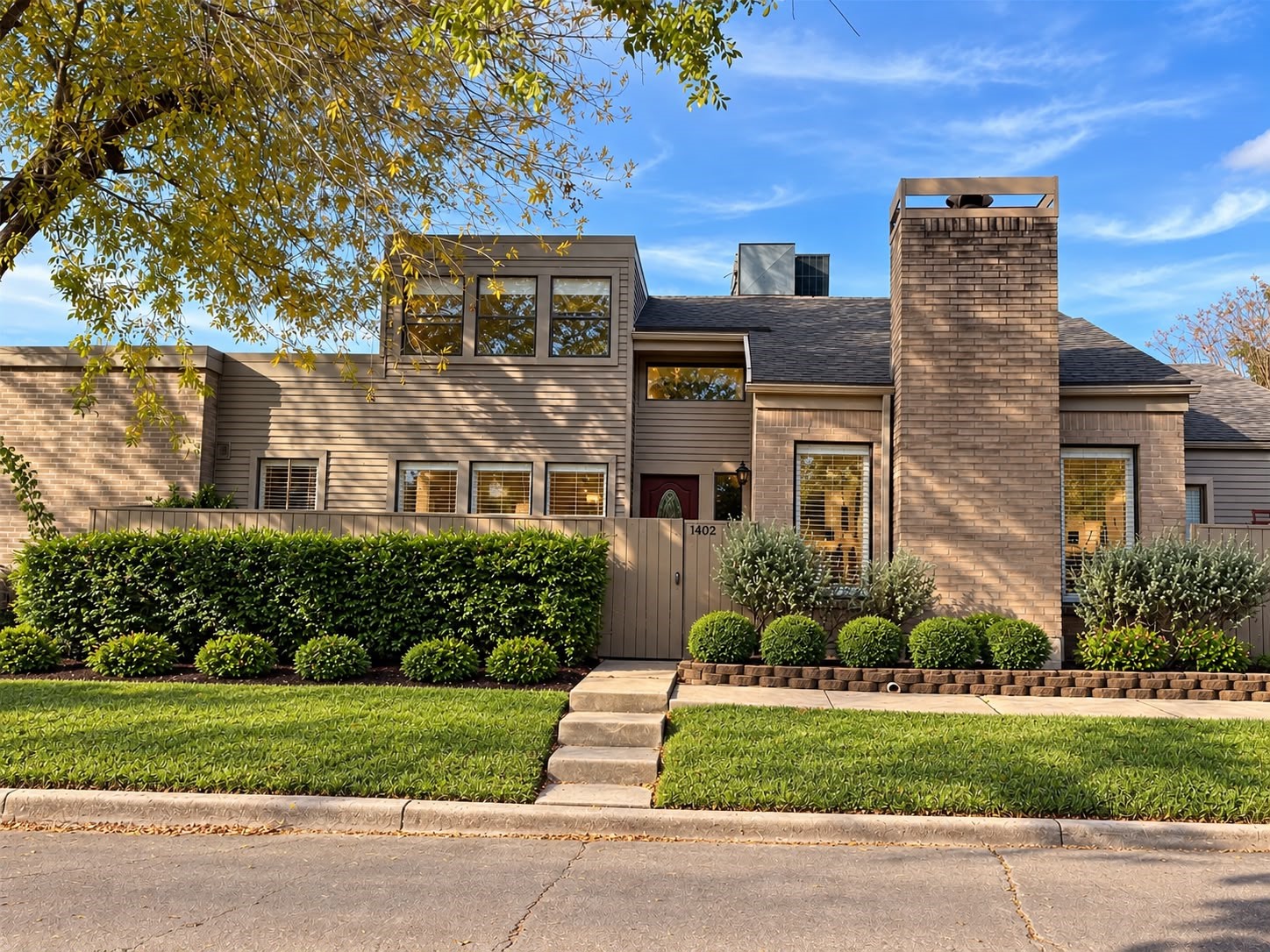 Beautiful front view of the home showcasing its brick exterior, landscaped yard, and inviting entryway. Beautiful front view of the home showcasing its brick exterior, landscaped yard, and inviting entryway.