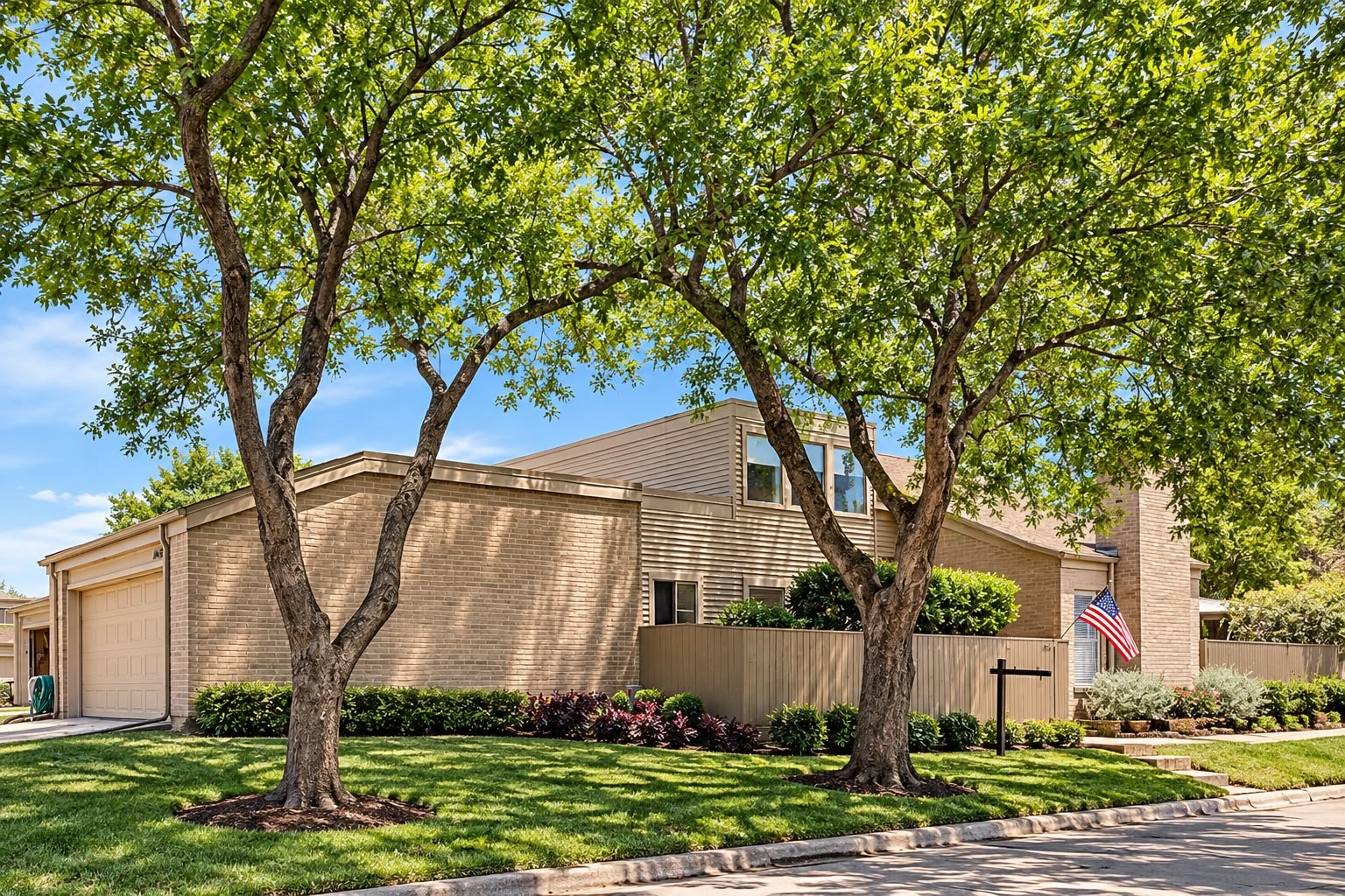 Attractive home exterior featuring mature shade trees, a welcoming entrance, and excellent curb appeal. Attractive home exterior featuring mature shade trees, a welcoming entrance, and excellent curb appeal.