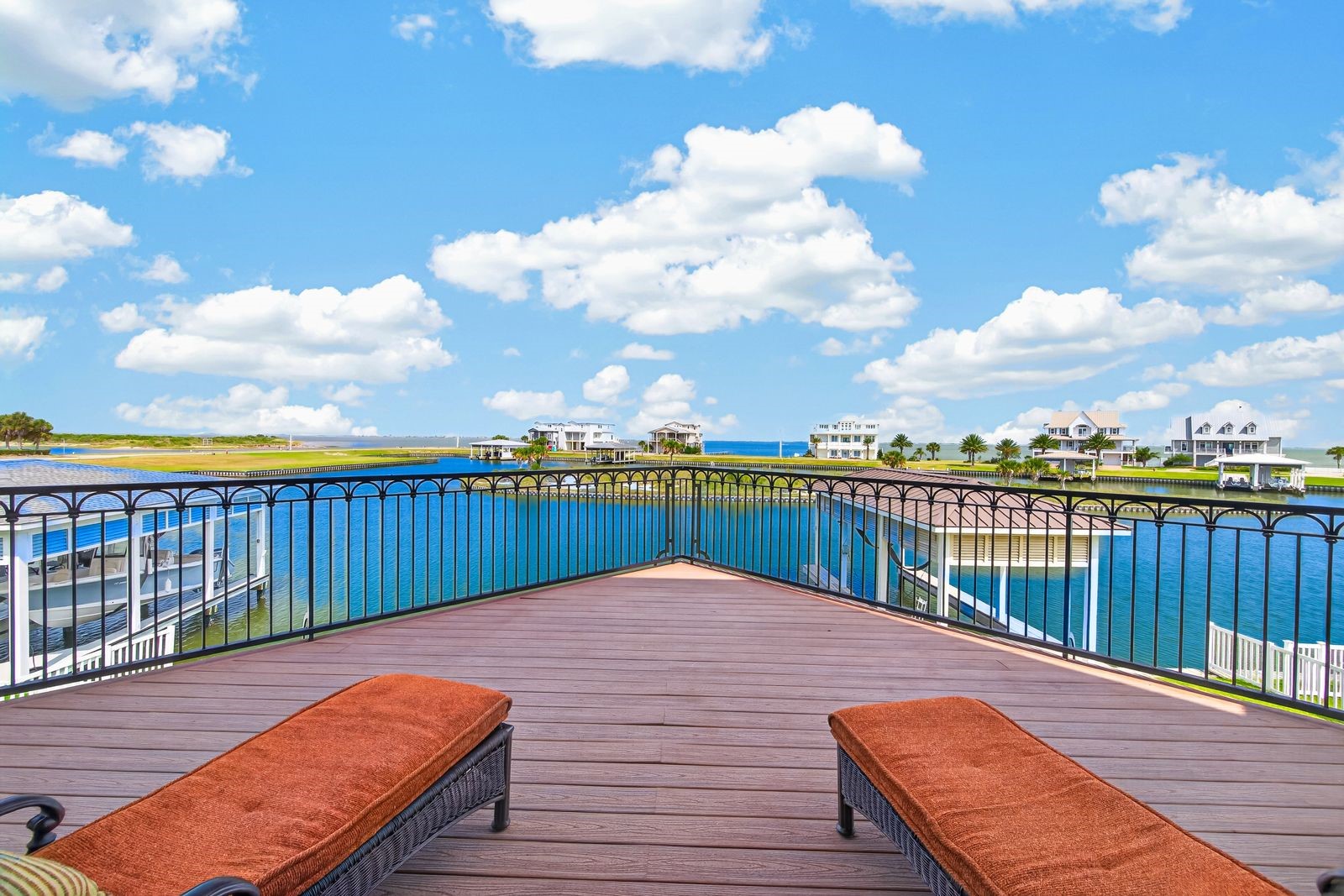 Experience breathtaking island and lake views from one of two expansive balconies, perfect for relaxation and entertaining.