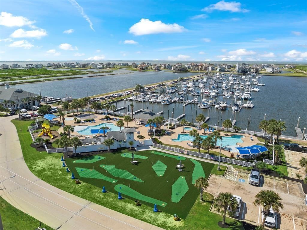 Embrace the ultimate coastal lifestyle at Harborwalk, where a resort style pool facility with a Flamingo Bar, a fun putt-putt area, and a bustling full-service marina with luxury yachts and boat launch create a perfect seaside escape.